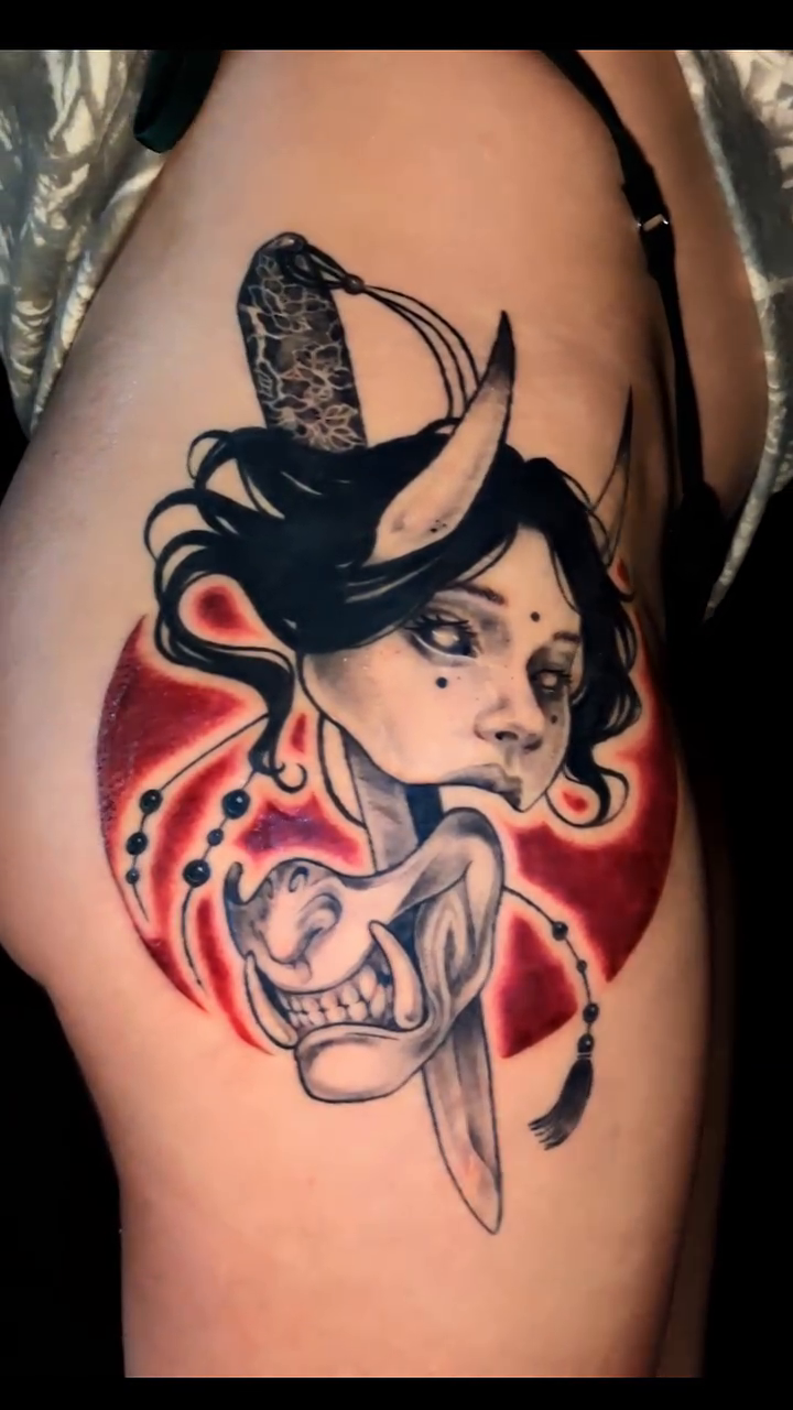 Geisha with a knife and skull realism tattoo on the thigh by Shannon