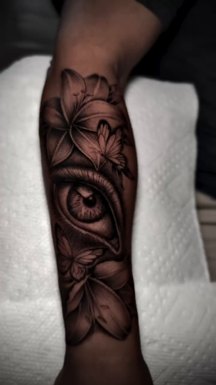 Eye with flowers realism tattoo by Ricky Salinas Jr. π€, San Antonio, Texas