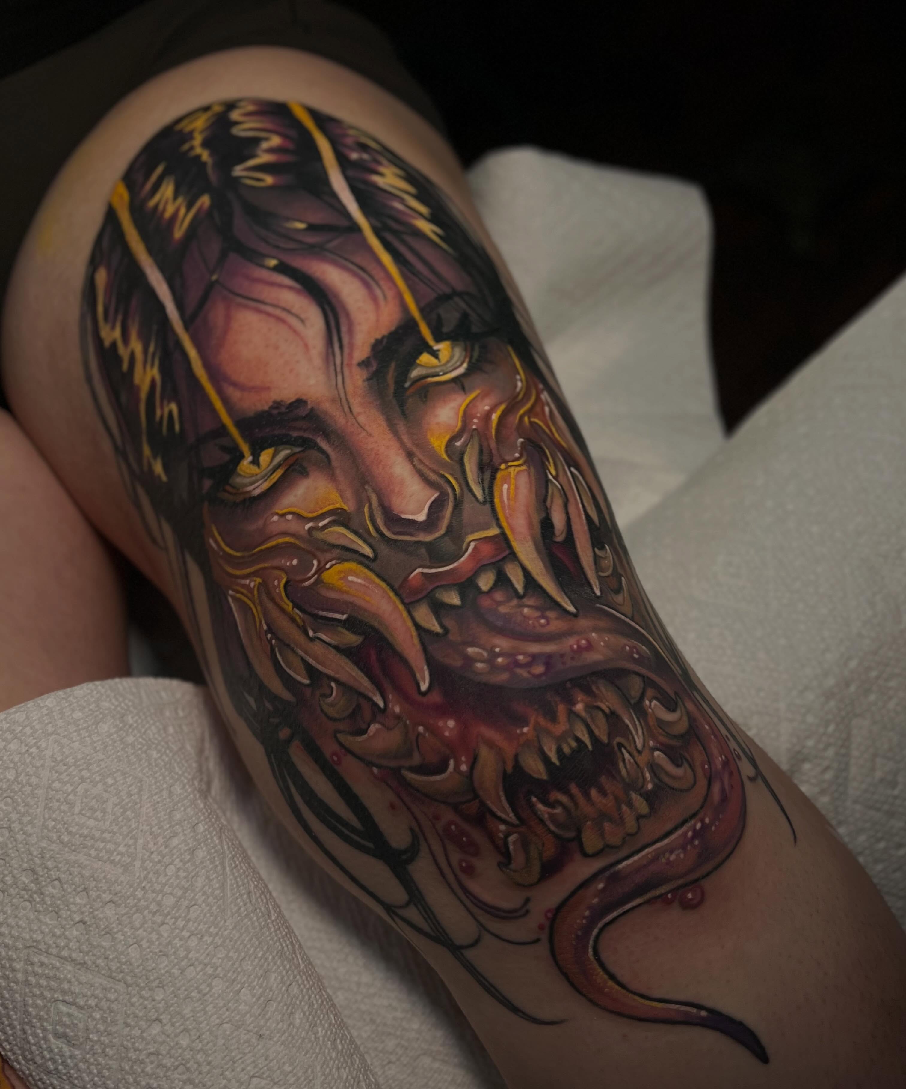 Demon face dark realism tattoo on the forearm by Jen Love