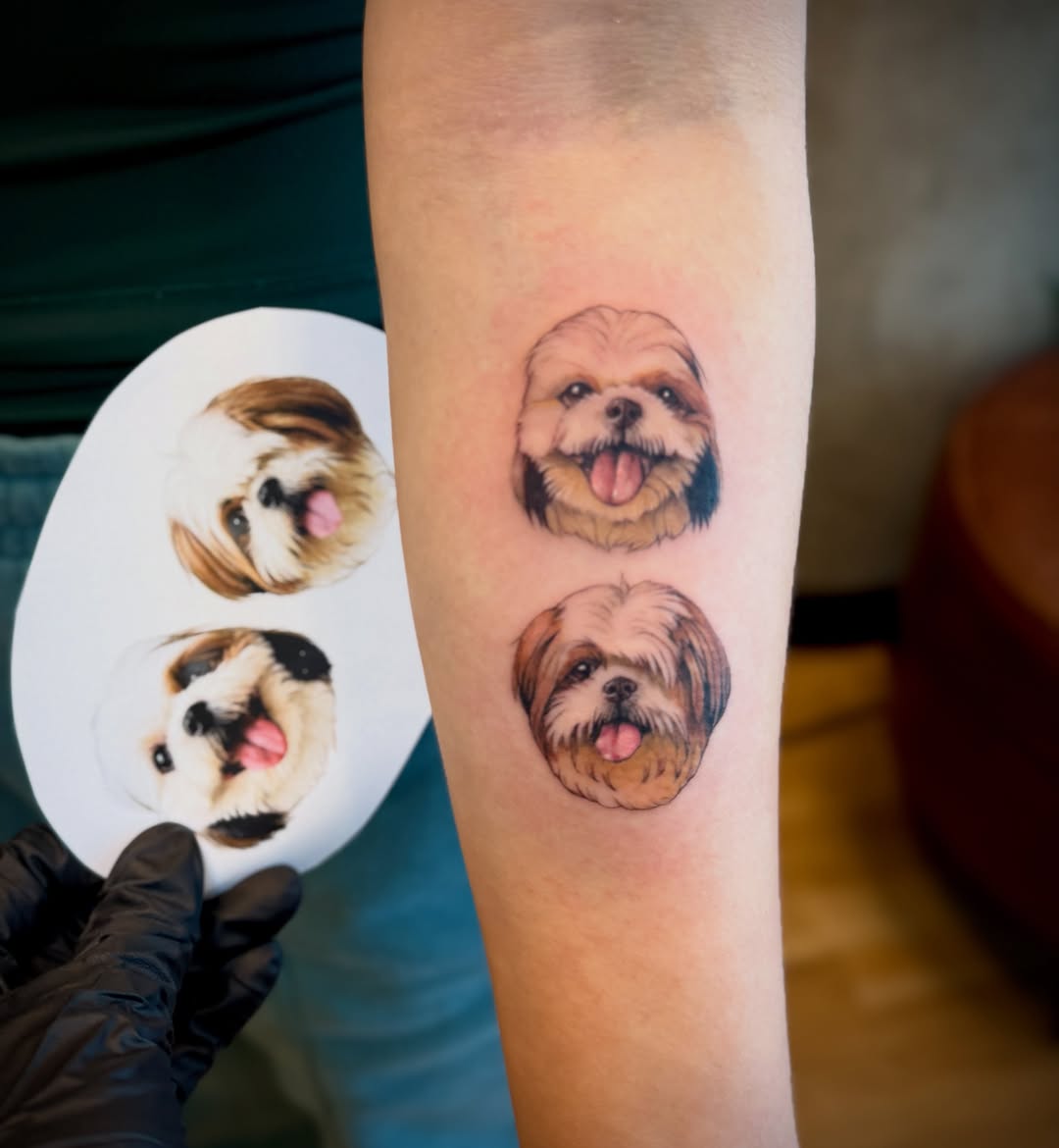 Dog realism tattoo on the forearm by Aristova Anastasia