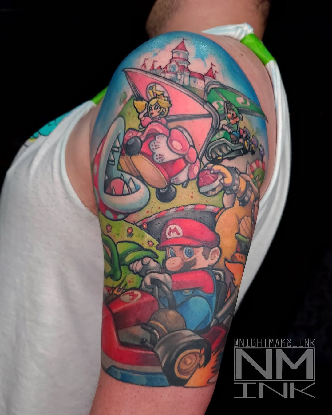 Mario Kart new school tattoo on the upper arm by Brandon Hildebrandt