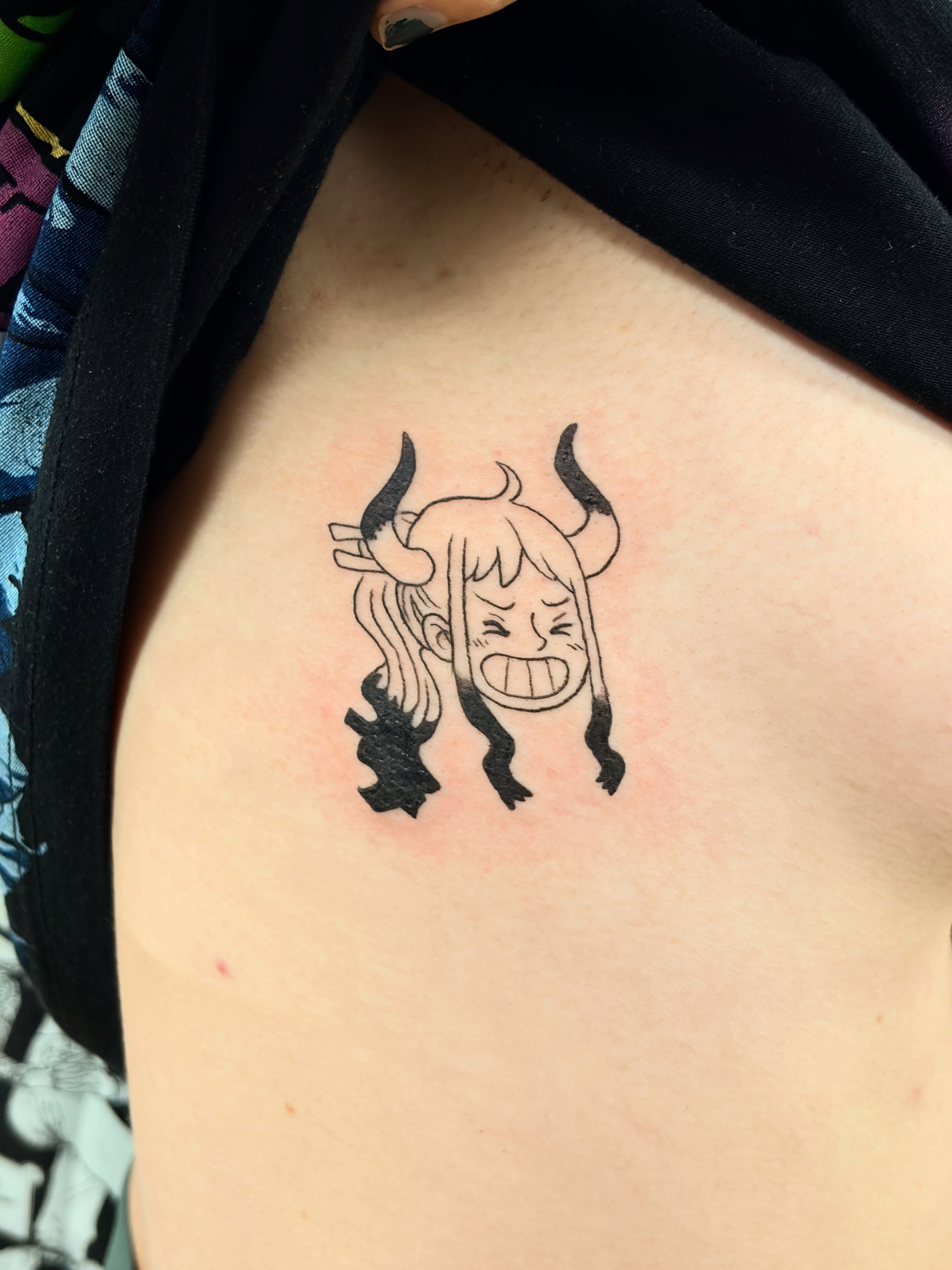 Angry girl with horns anime tattoo by Chris, Cleveland, Ohio
