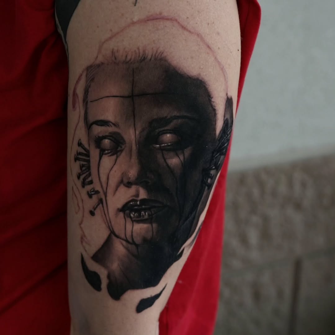 Tattoo by @dredd_tattoos — dark_realism, black_and_grey
