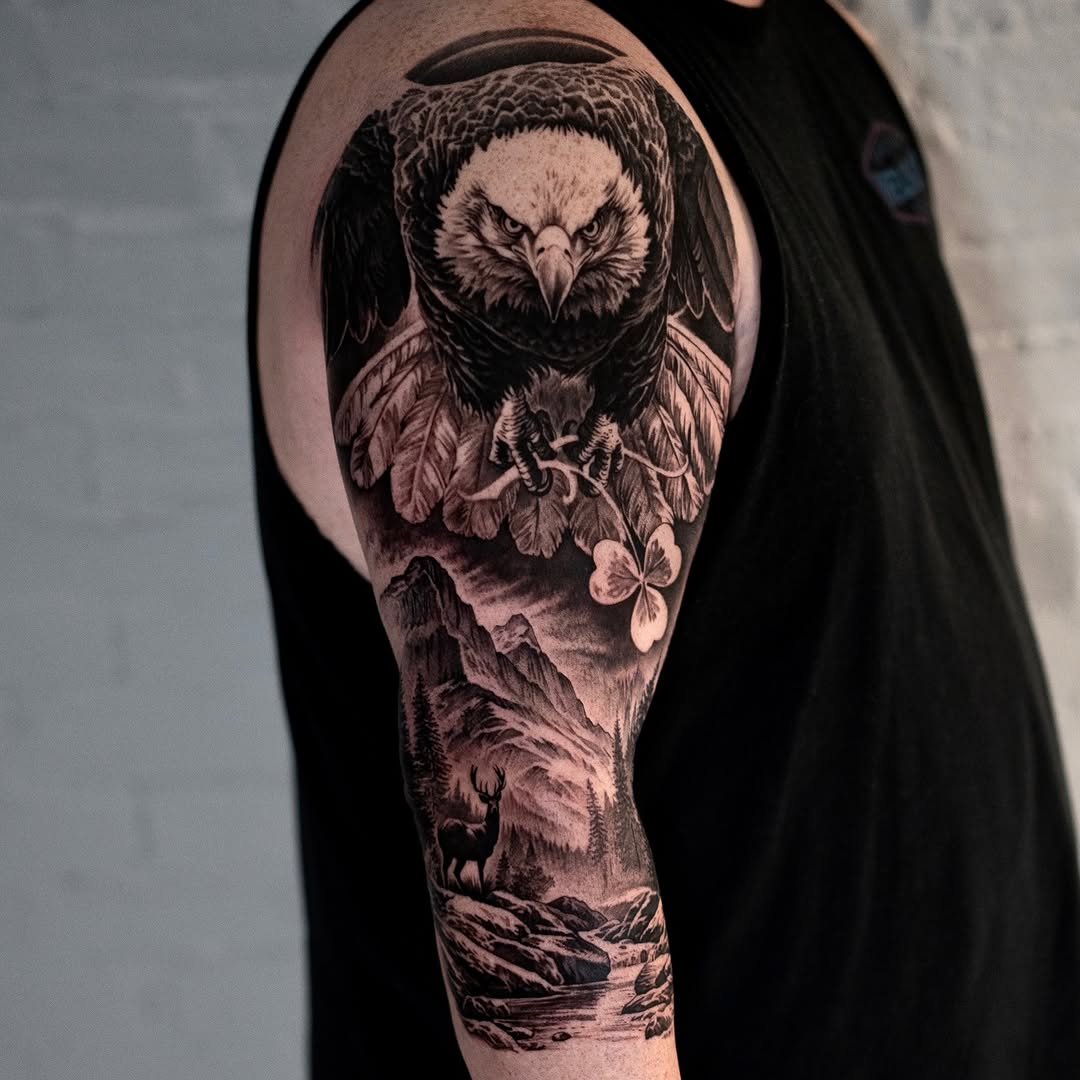Eagle and mountain landscape with deer realism tattoo on the forearm by Mark Vata