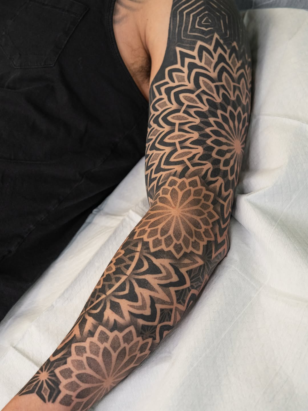 Tattoo by @rjxdots — geometric, dotwork