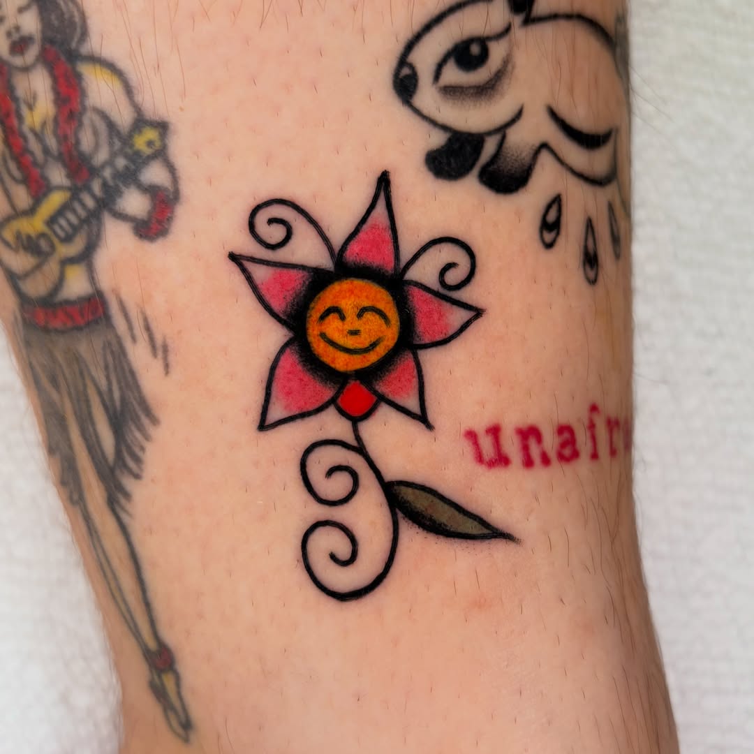 Sunflower new school tattoo on the forearm by rachael