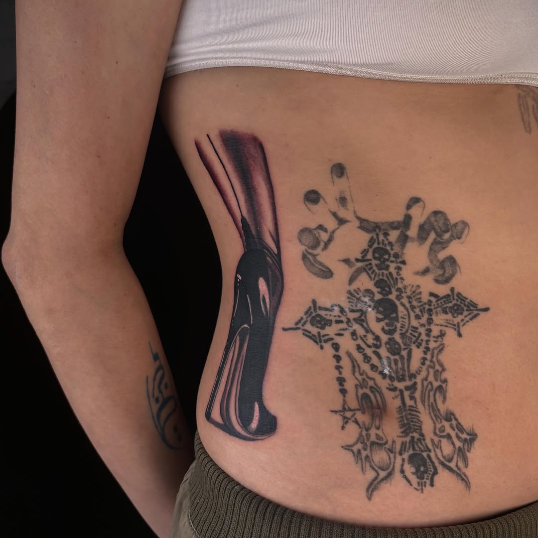 High heel shoe cyber sigilism tattoo on the torso by laura bianca