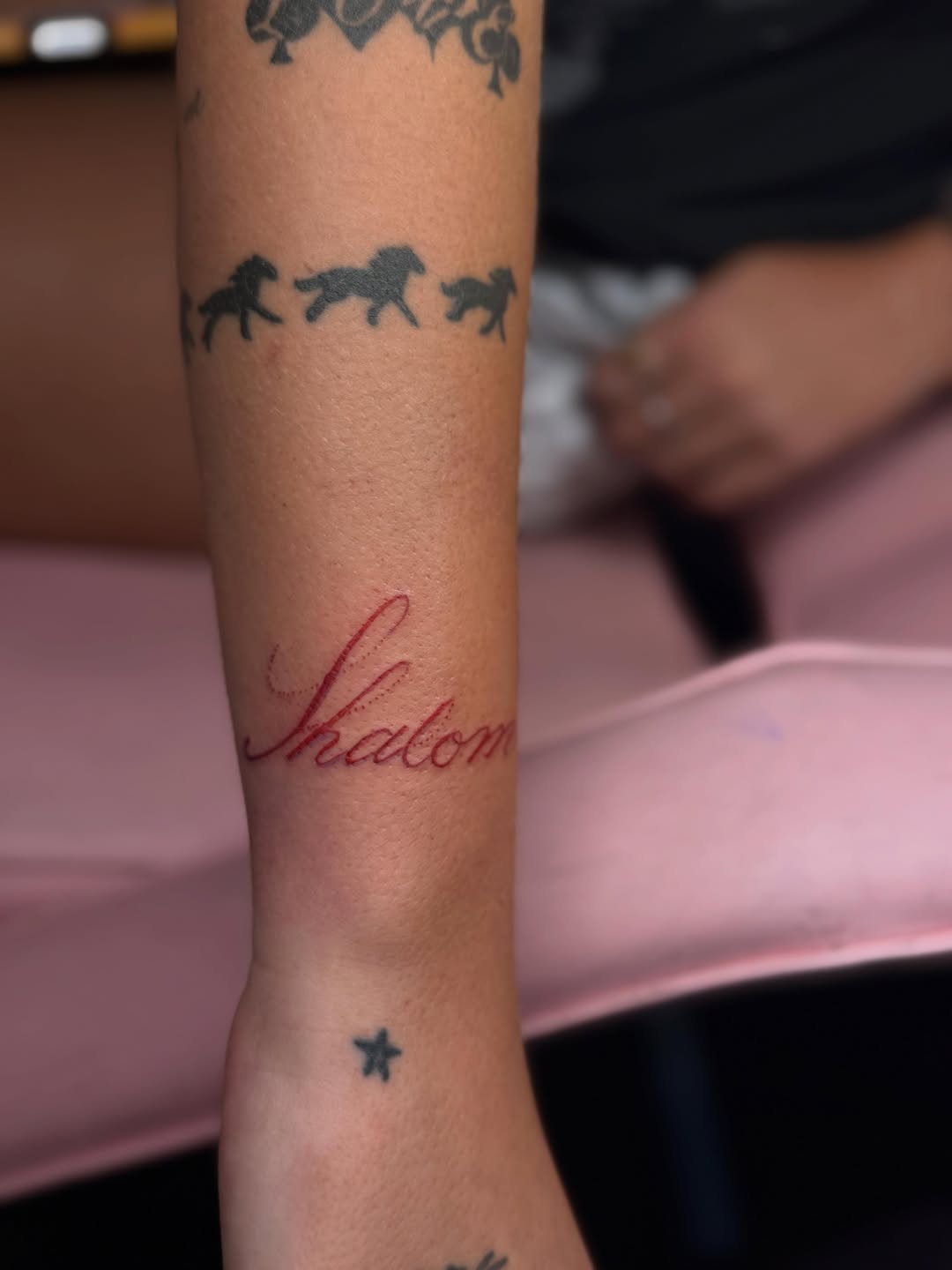 Tattoo by @santos.tattoos.official — lettering_script, fine_line