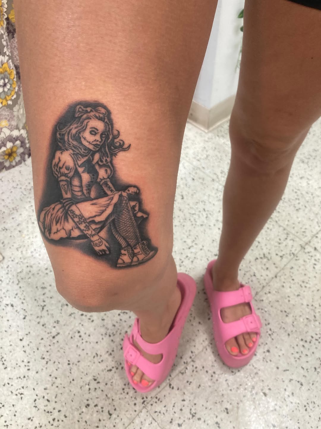 Creepy doll realism tattoo on the thigh by Timothy Murtaugh