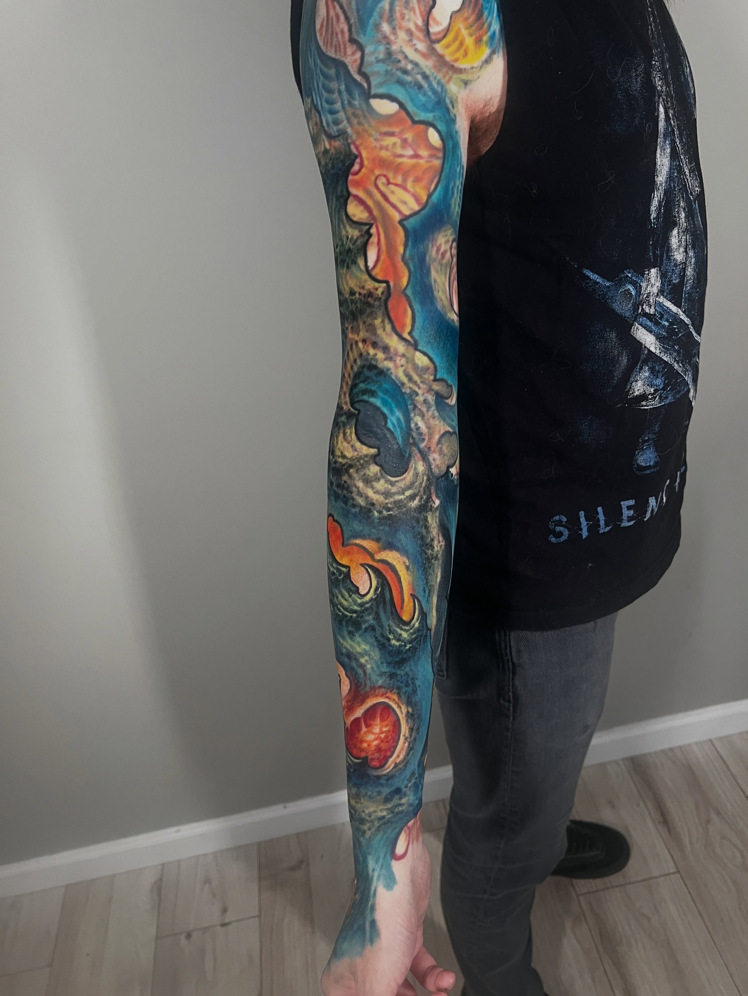 Abstract waves dotwork tattoo on the forearm by Ty McEwen Tattoo Artist │ Bioorganic │