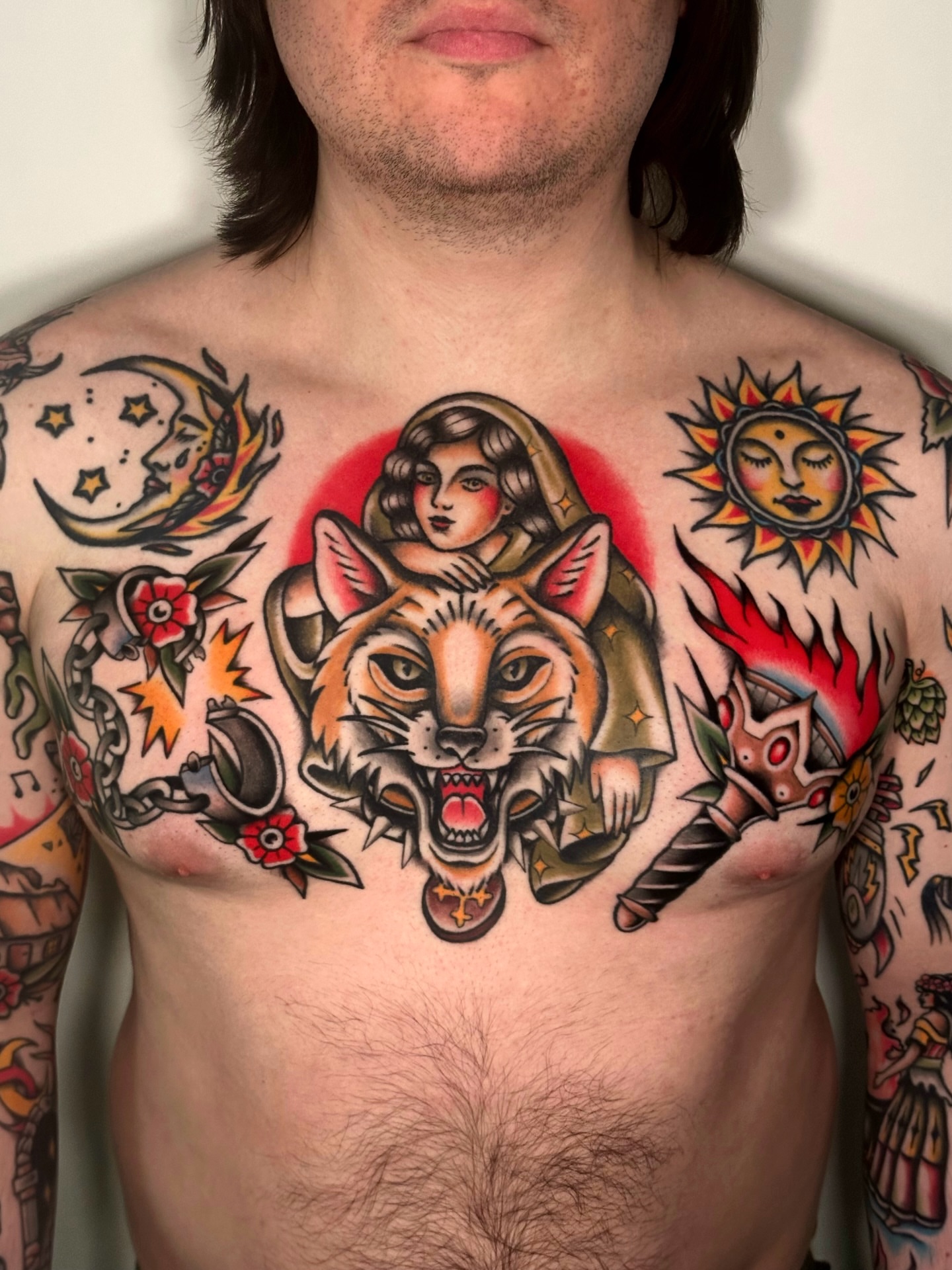 Woman riding tiger American traditional tattoo on the chest by Black and color tattoo!