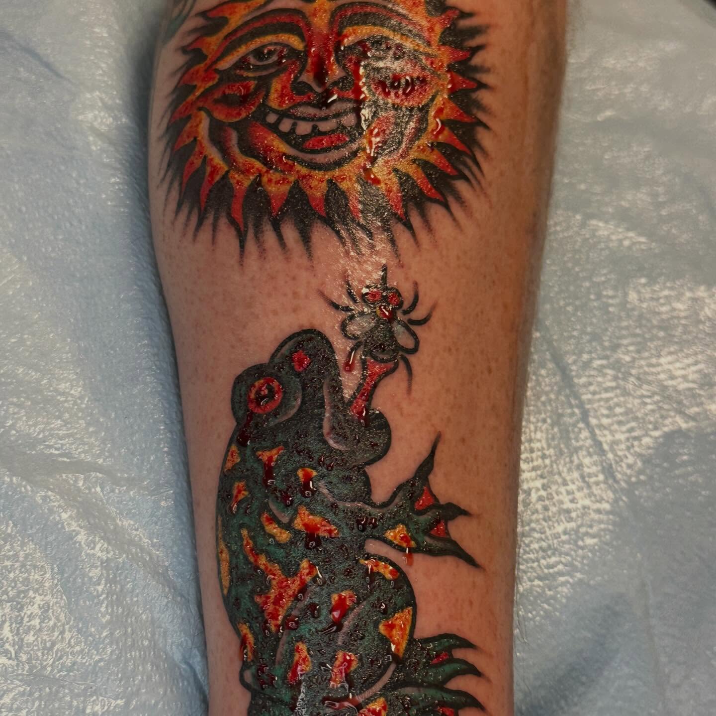 Sun and frog American traditional tattoo on the forearm by Jared Allen, Saint Petersburg, Florida