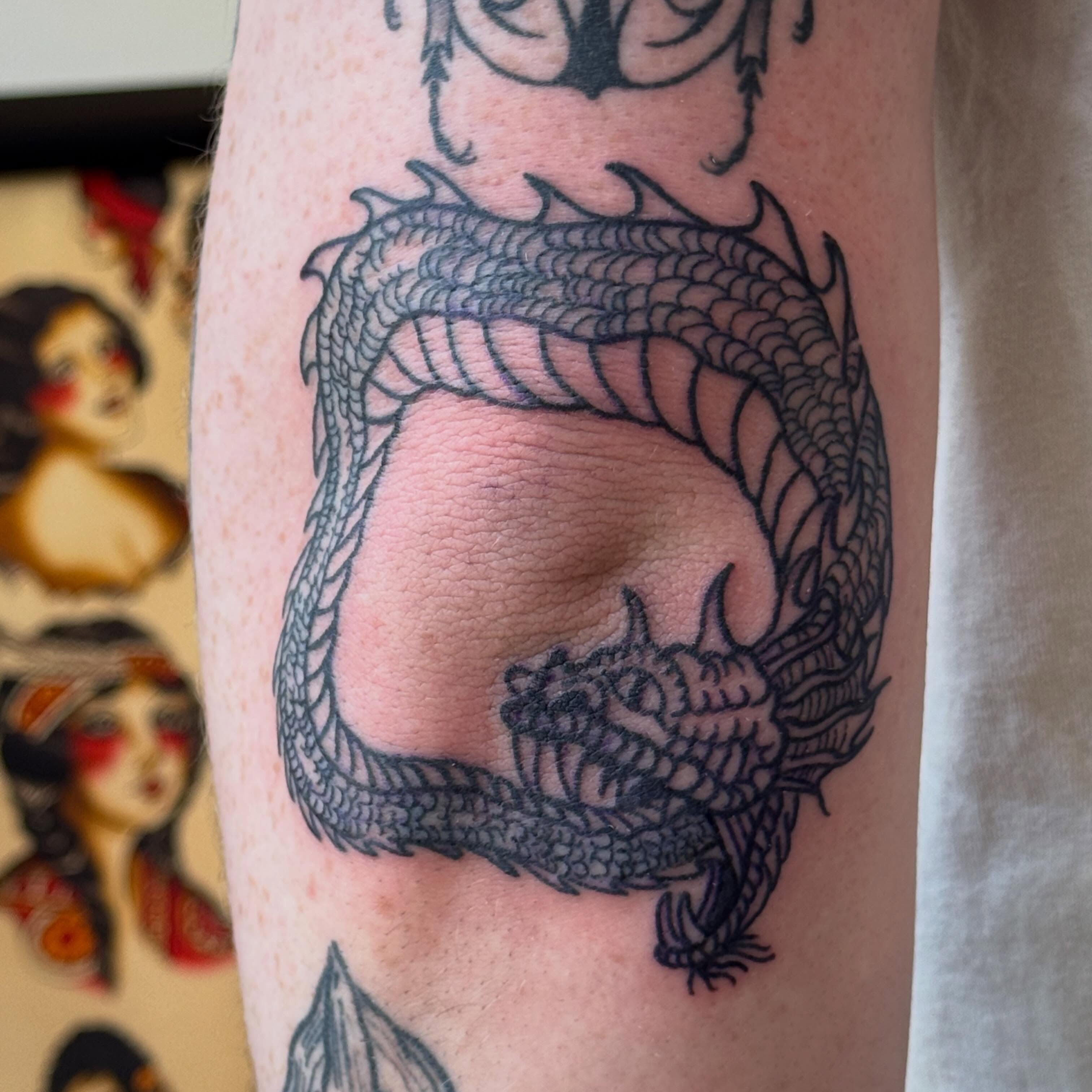 Dragon black and grey tattoo on the forearm by Eric Guntor, Philadelphia, Pennsylvania