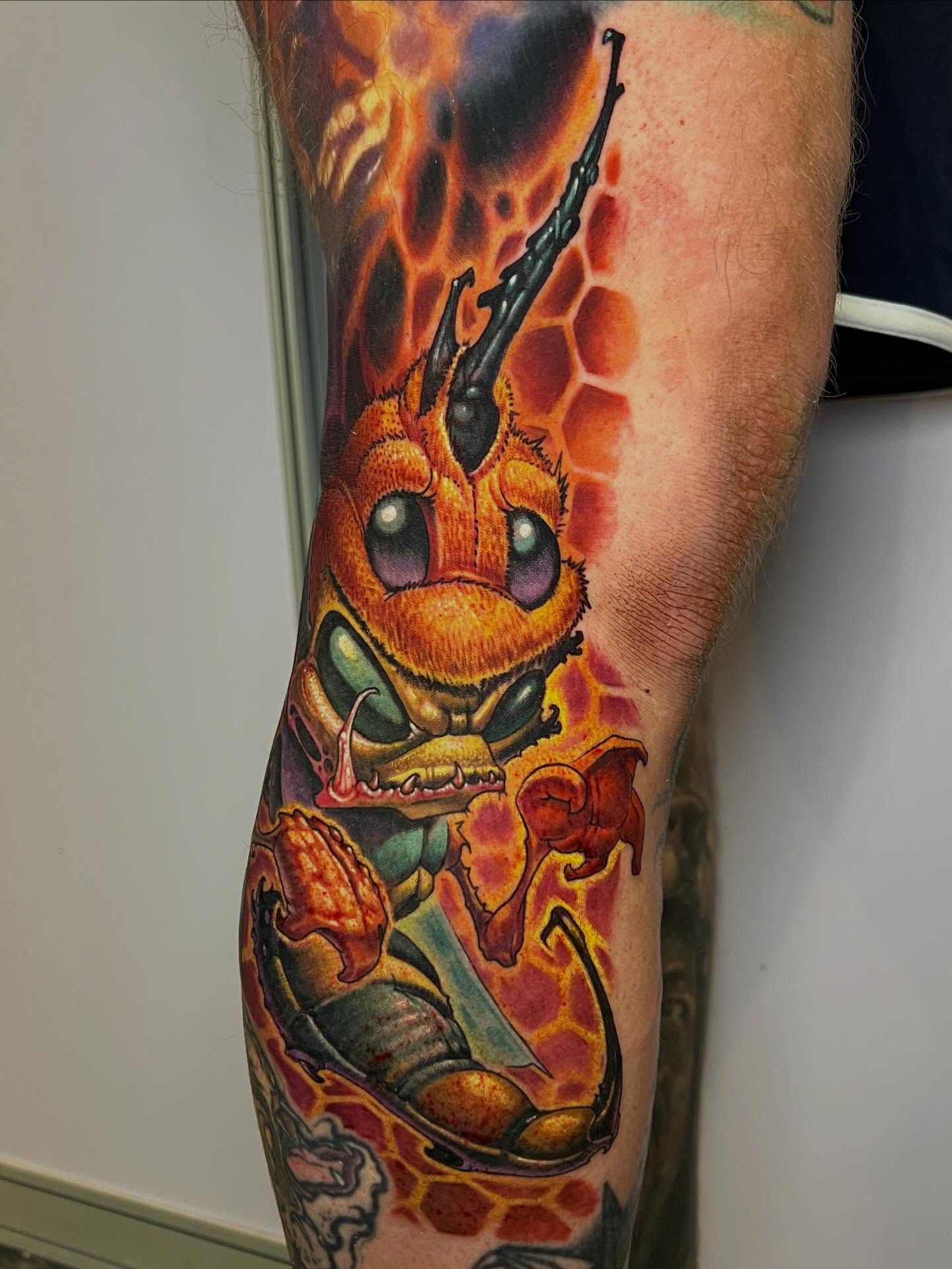 Bee new school tattoo on the forearm by Jesse Smith