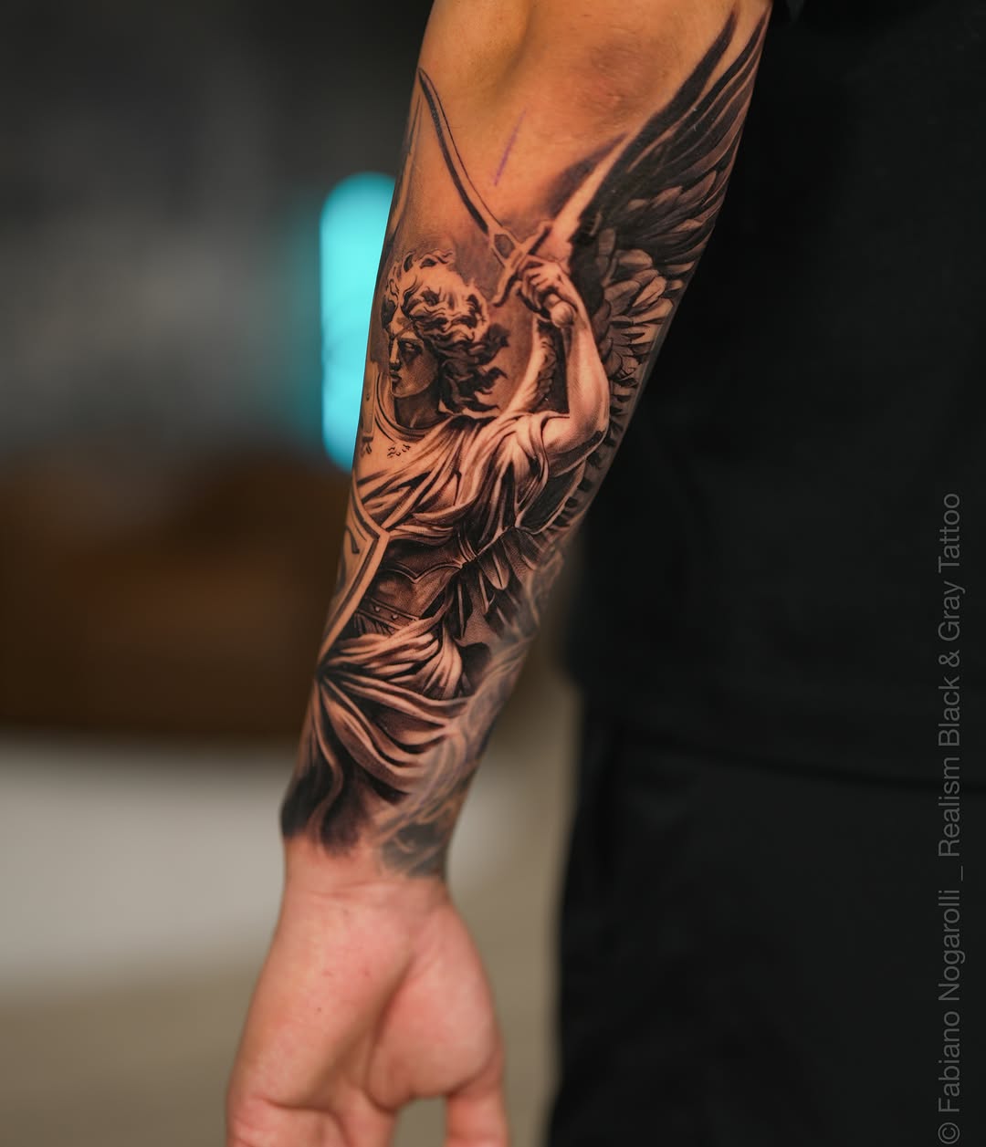 Tattoo by @nogarolli_tattoo — realism, black_and_grey