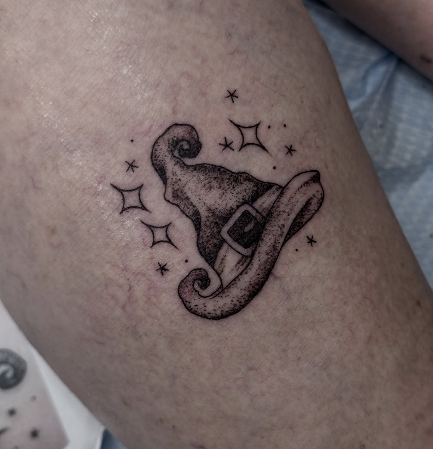 Wizard hat dotwork tattoo on the thigh by Caity