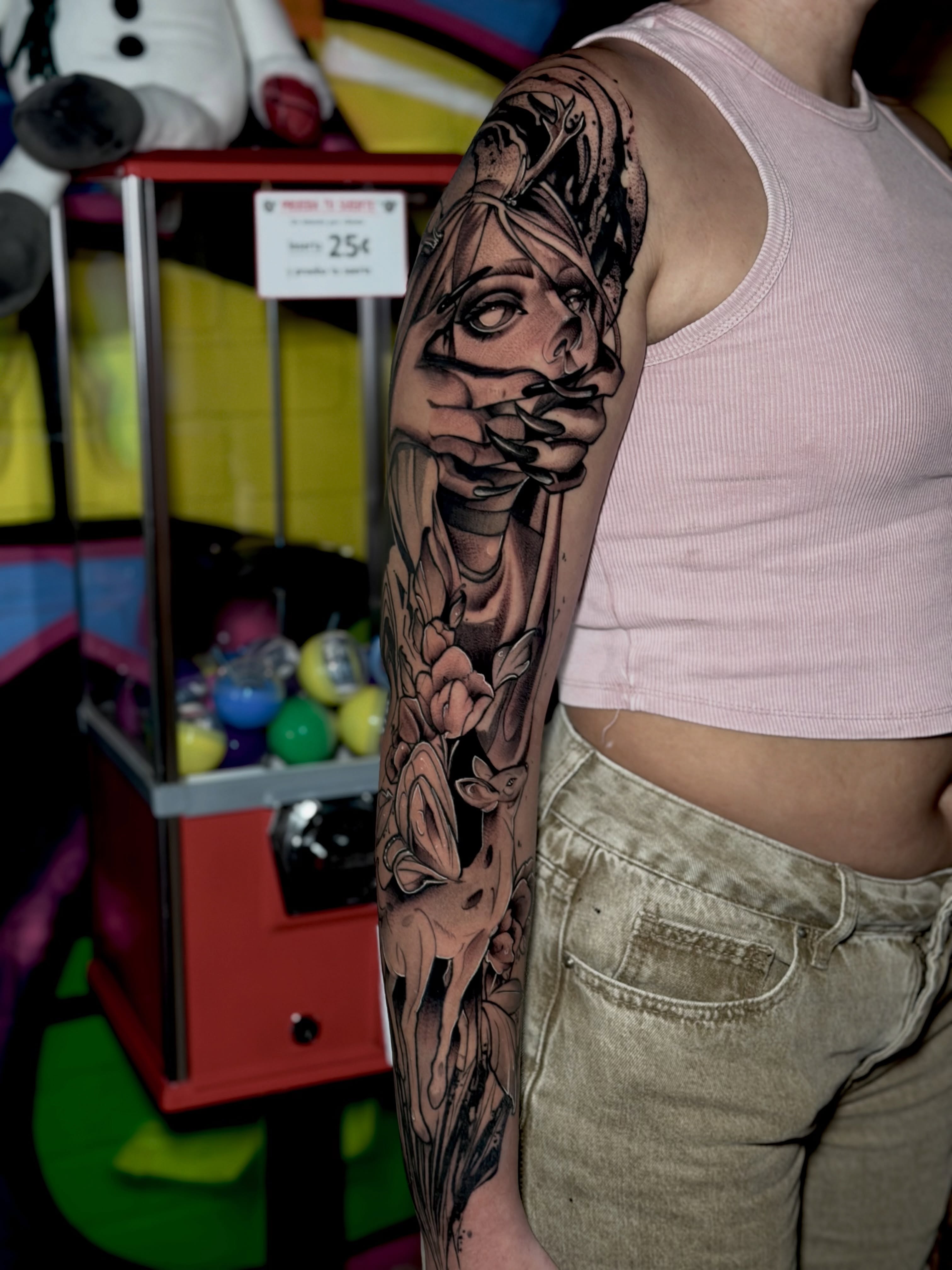 Woman with floral elements realism tattoo on the forearm by Keyla Valdes, Miami, Florida