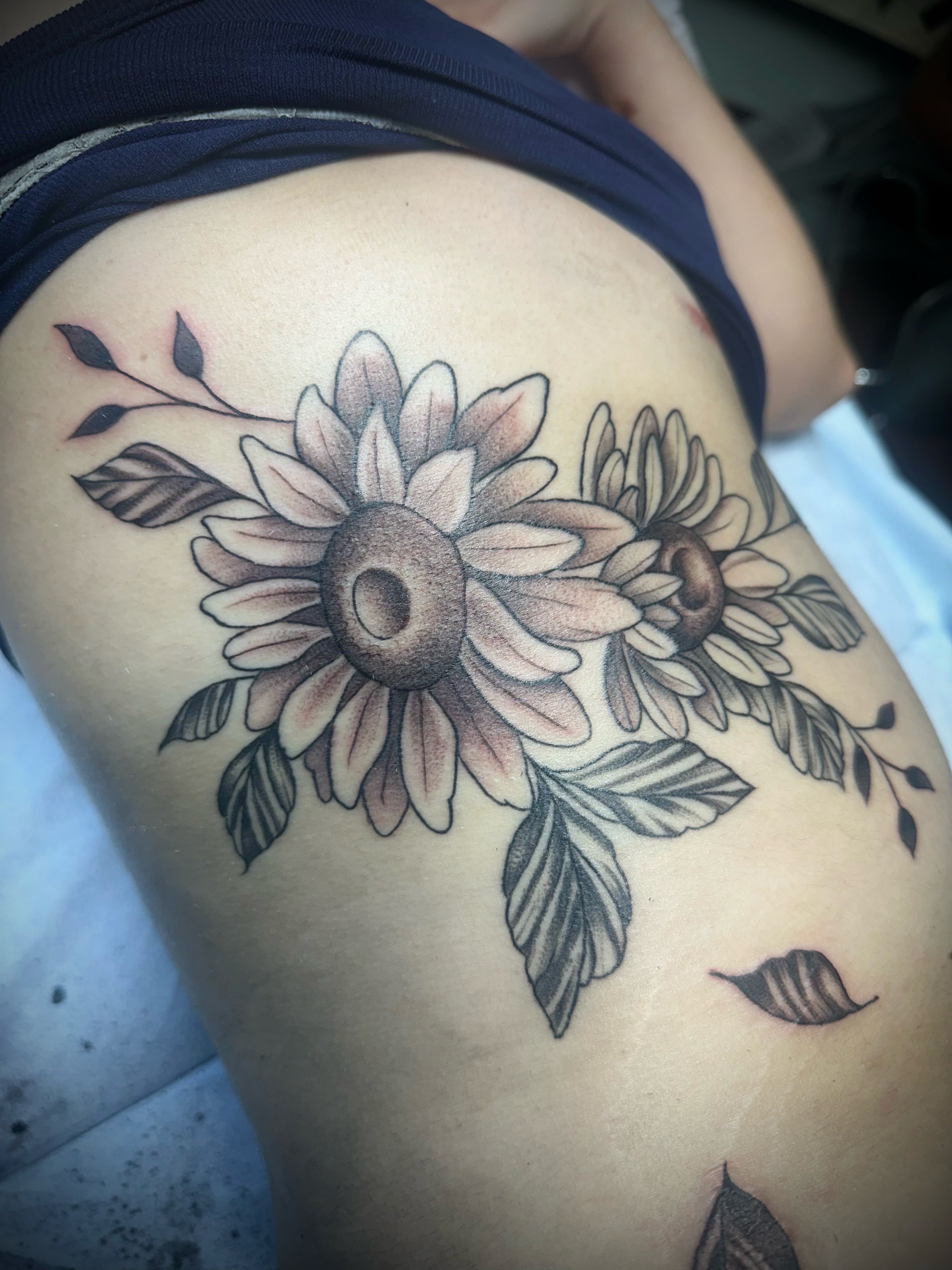 Sunflower black and grey tattoo on the thigh by 🥀Chloe Miller
