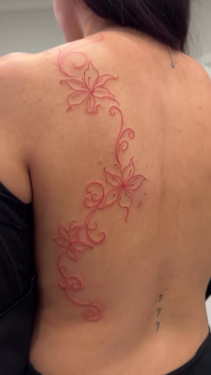 Floral vine tattoo on back blackwork tattoo on the back by Jennifer Garcia R - Vegas tattoo artist