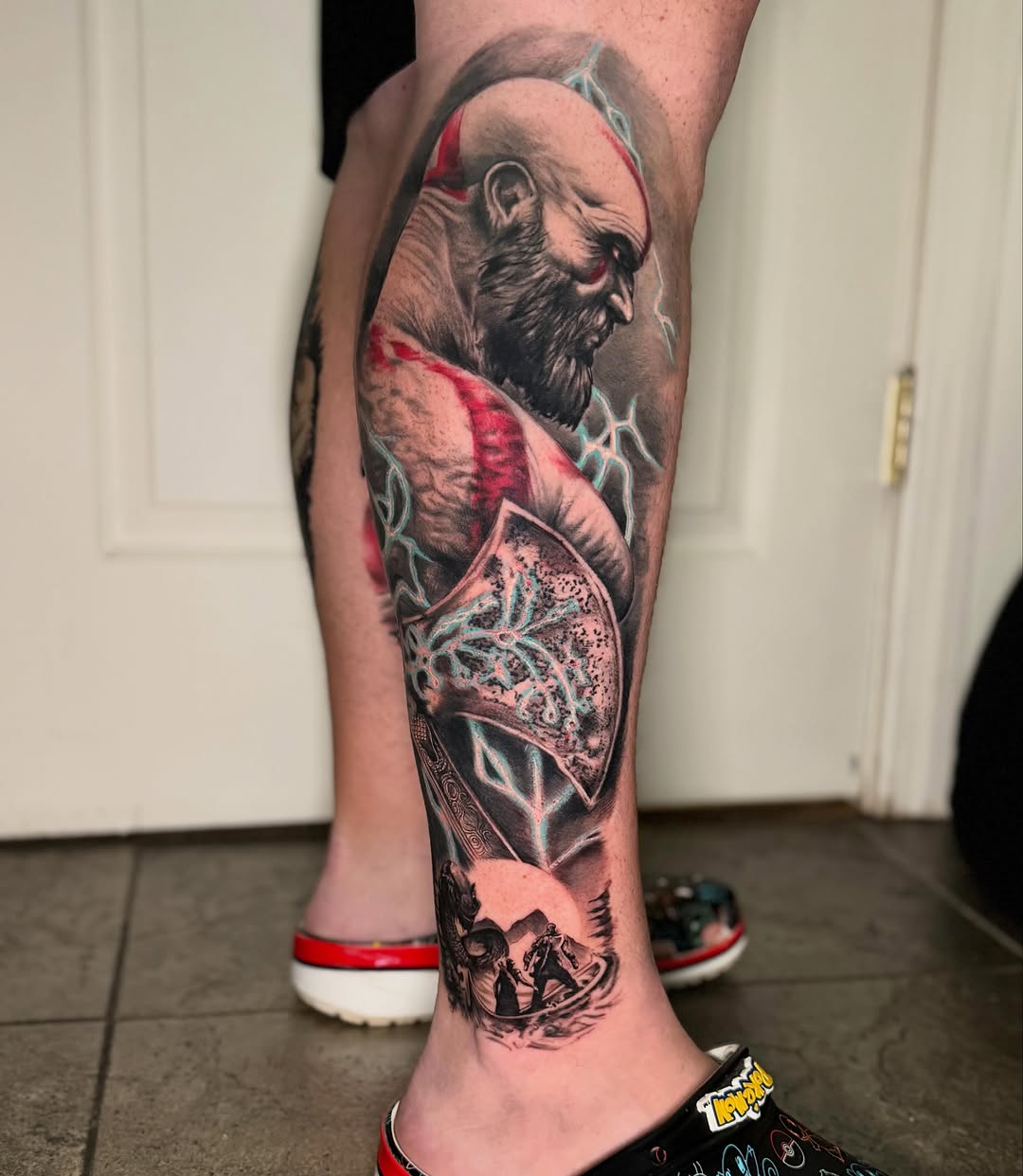 Kratos from God of War new school tattoo on the calf by Vega