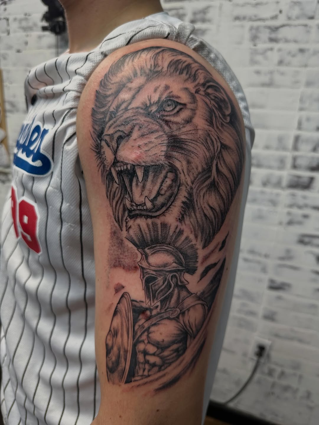 Tattoo by @bboyemo — realism, black_and_grey