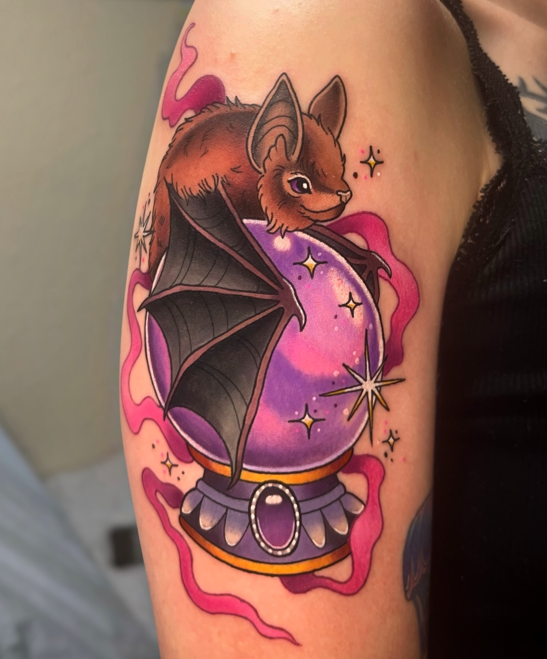 Bat crystal ball new school tattoo on the forearm by Nicole Skalski