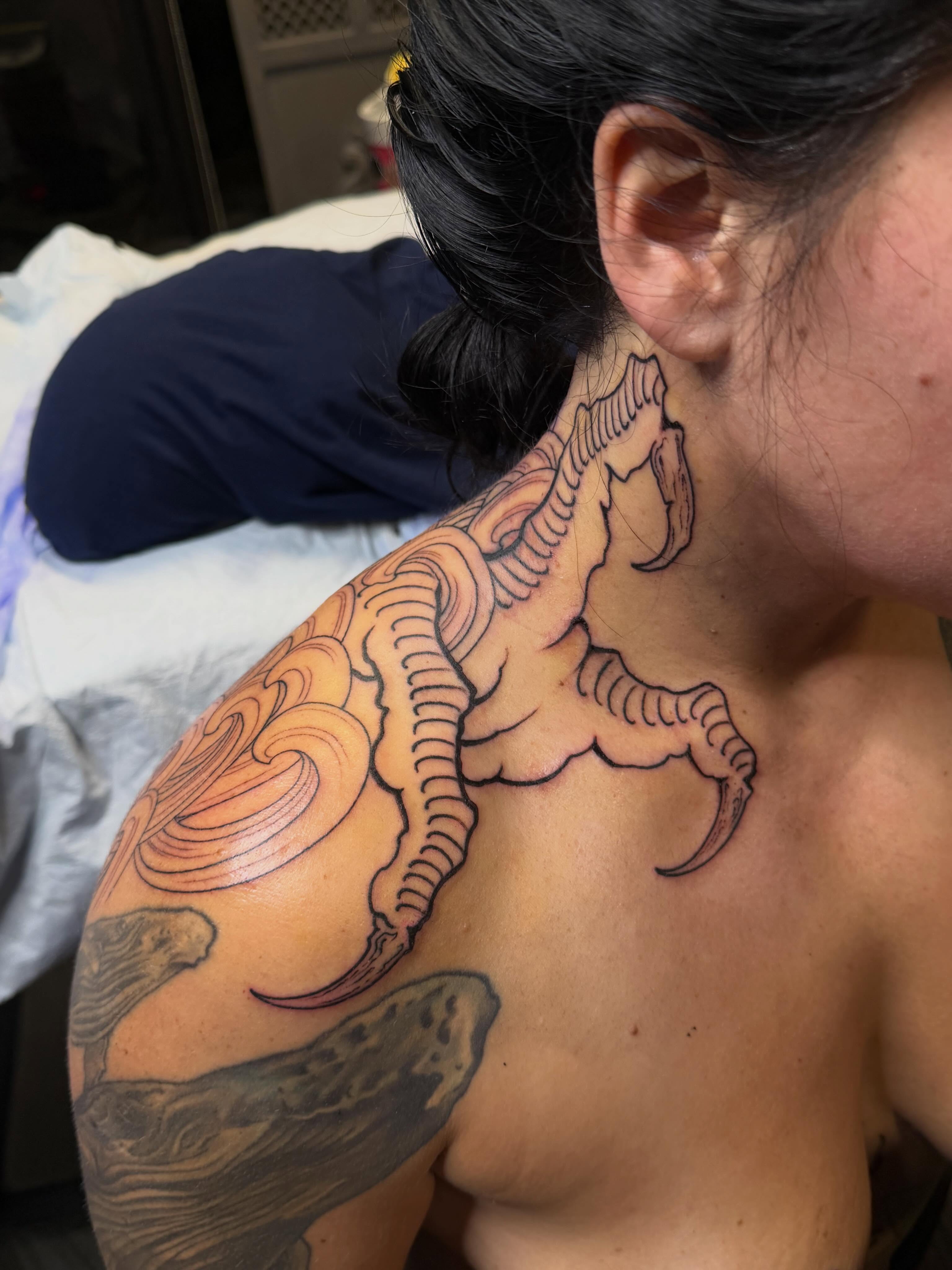 Serpent American traditional tattoo on the shoulder by <