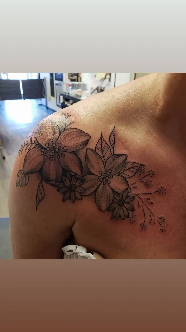 Floral shoulder tattoo dotwork tattoo on the chest by Greg Romero (el chamo), Millcreek, Utah