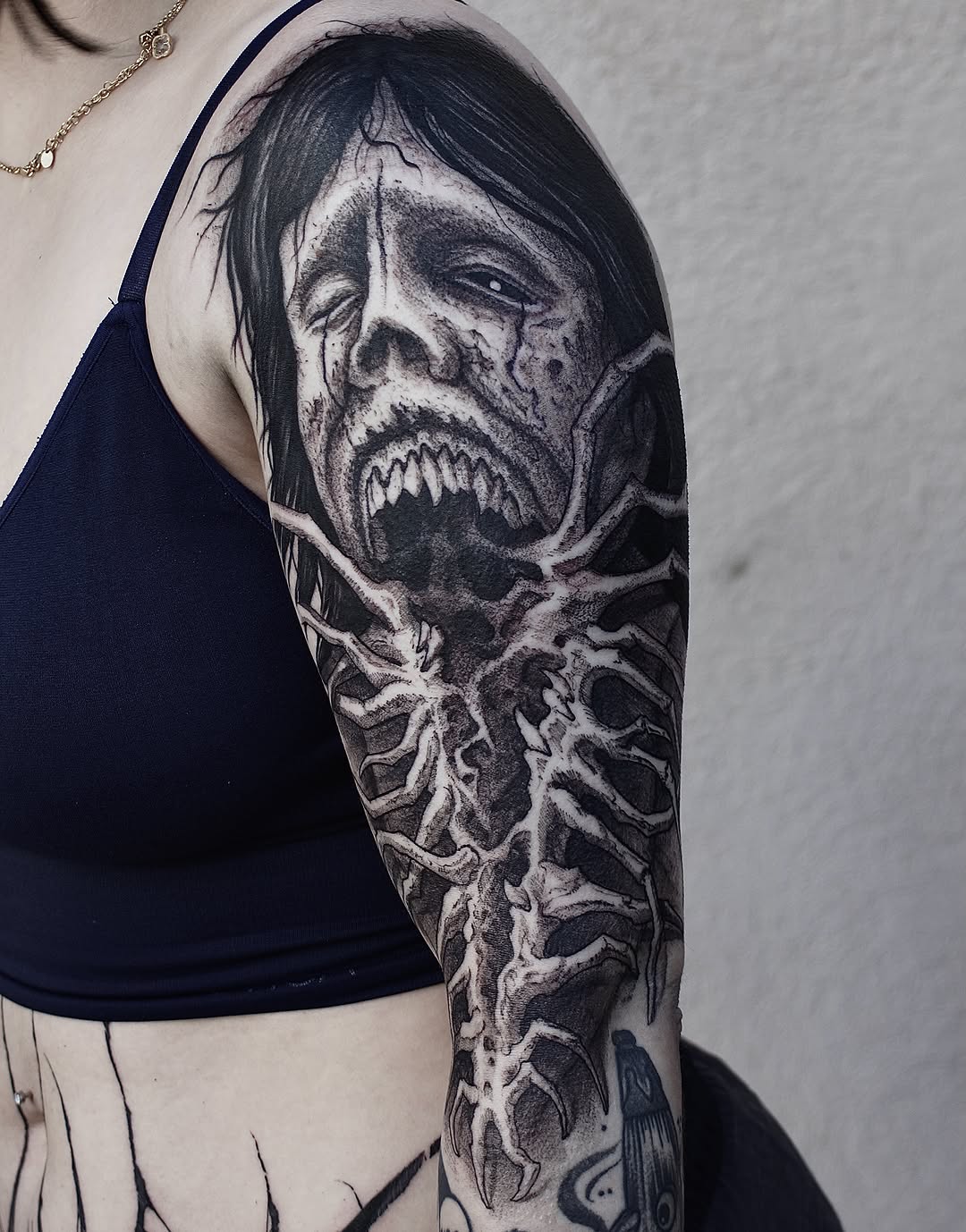 Tattoo by @bloodstonetattoos — dark_realism, black_and_grey
