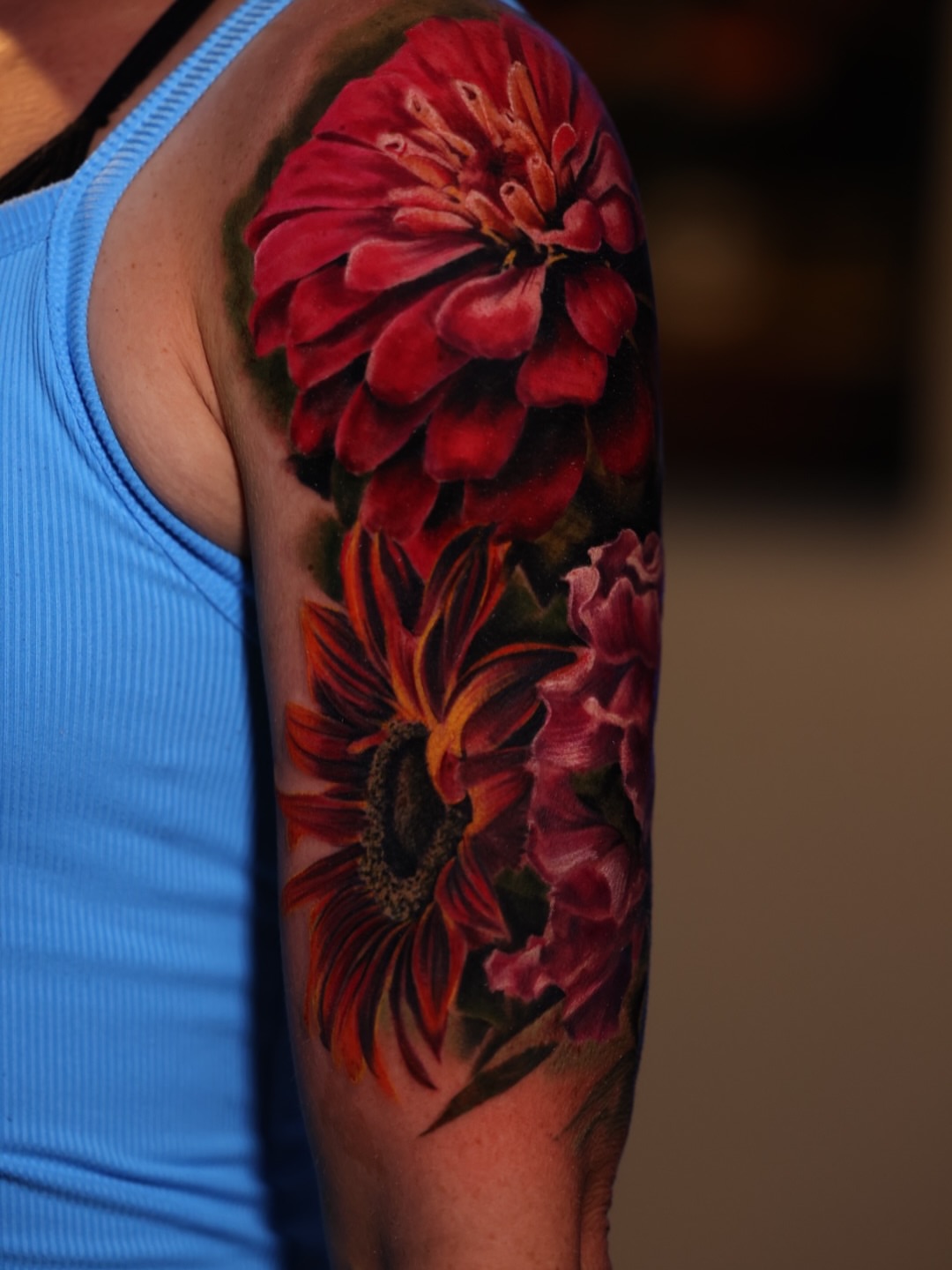 Flowers realism tattoo on the forearm by Brandon Sontag