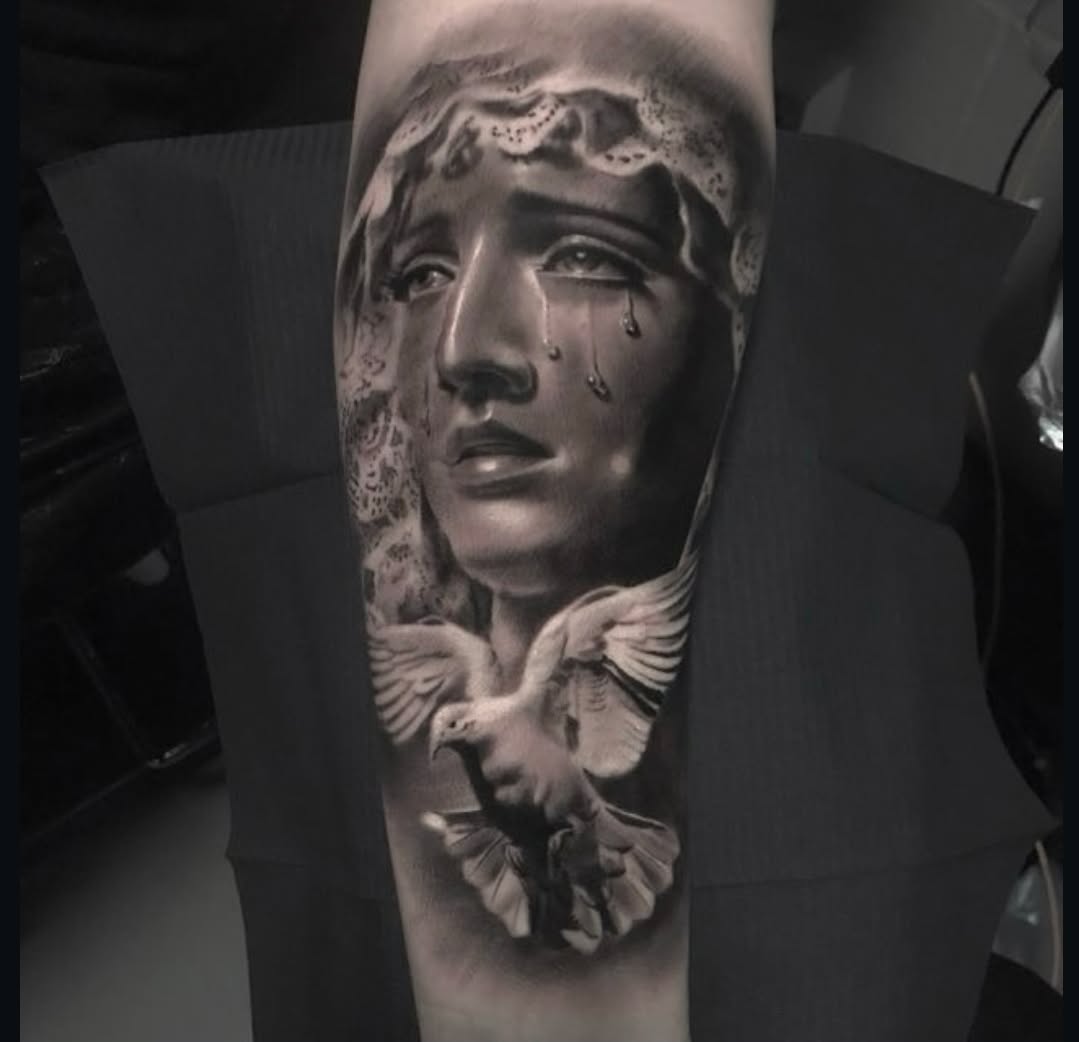 Tattoo by @kaostattooart — realism, black_and_grey