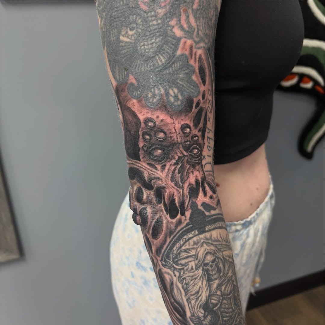 Tattoo by @tattoos_by_jack13 — black_and_grey, dark_realism