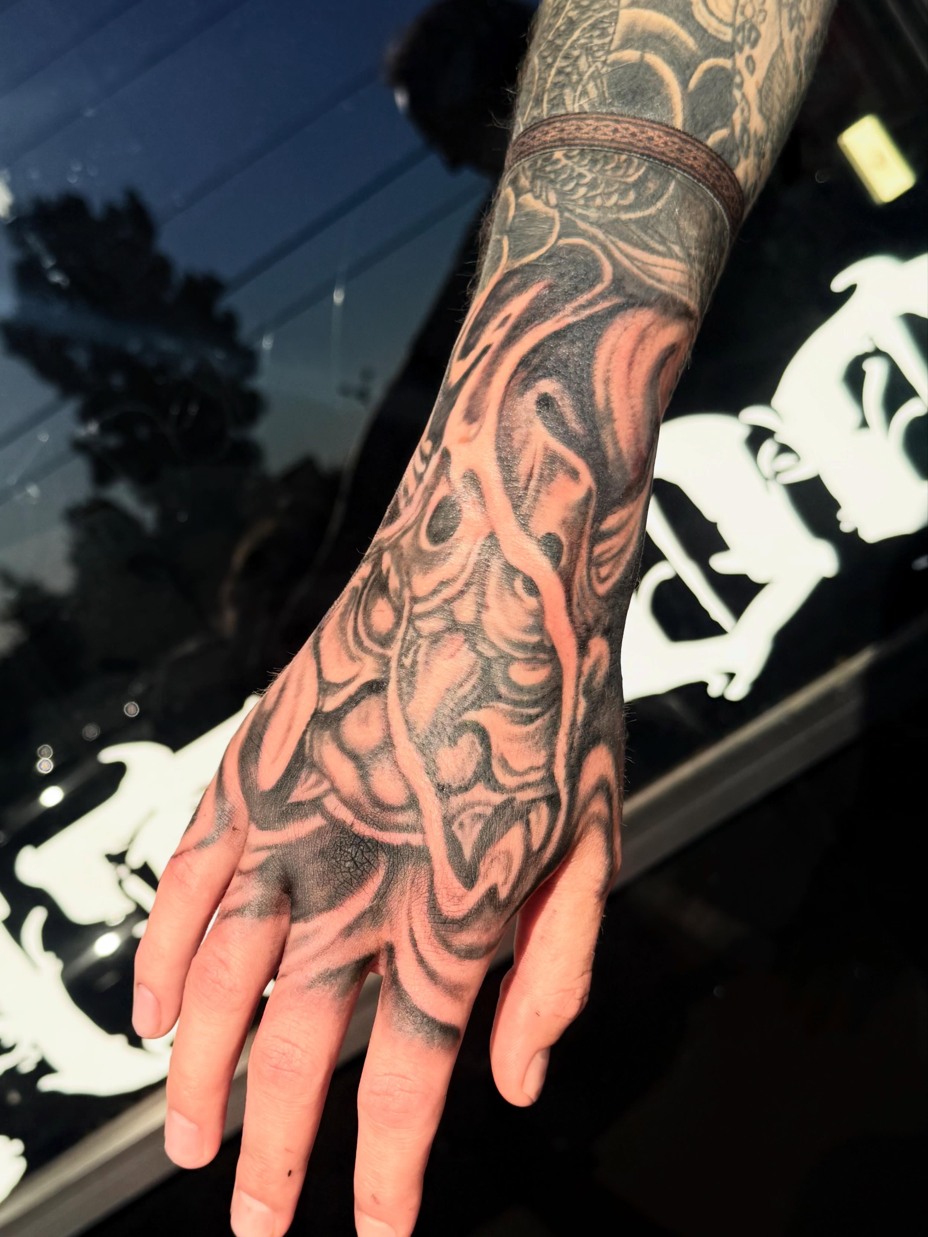 Abstract skull dark realism tattoo on the hand by Teara faith krigbaum