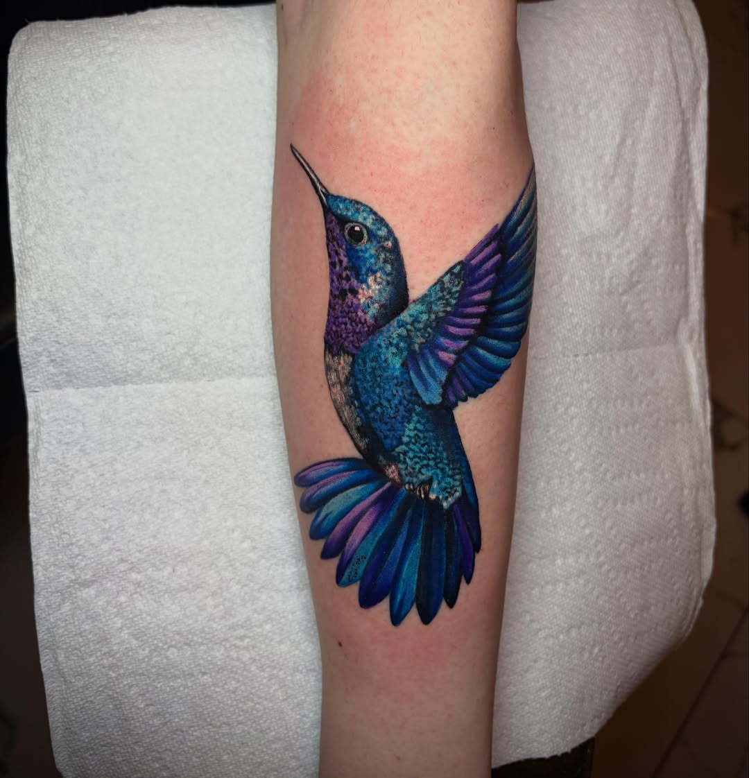 Hummingbird realism tattoo on the forearm by Rachel Sellers