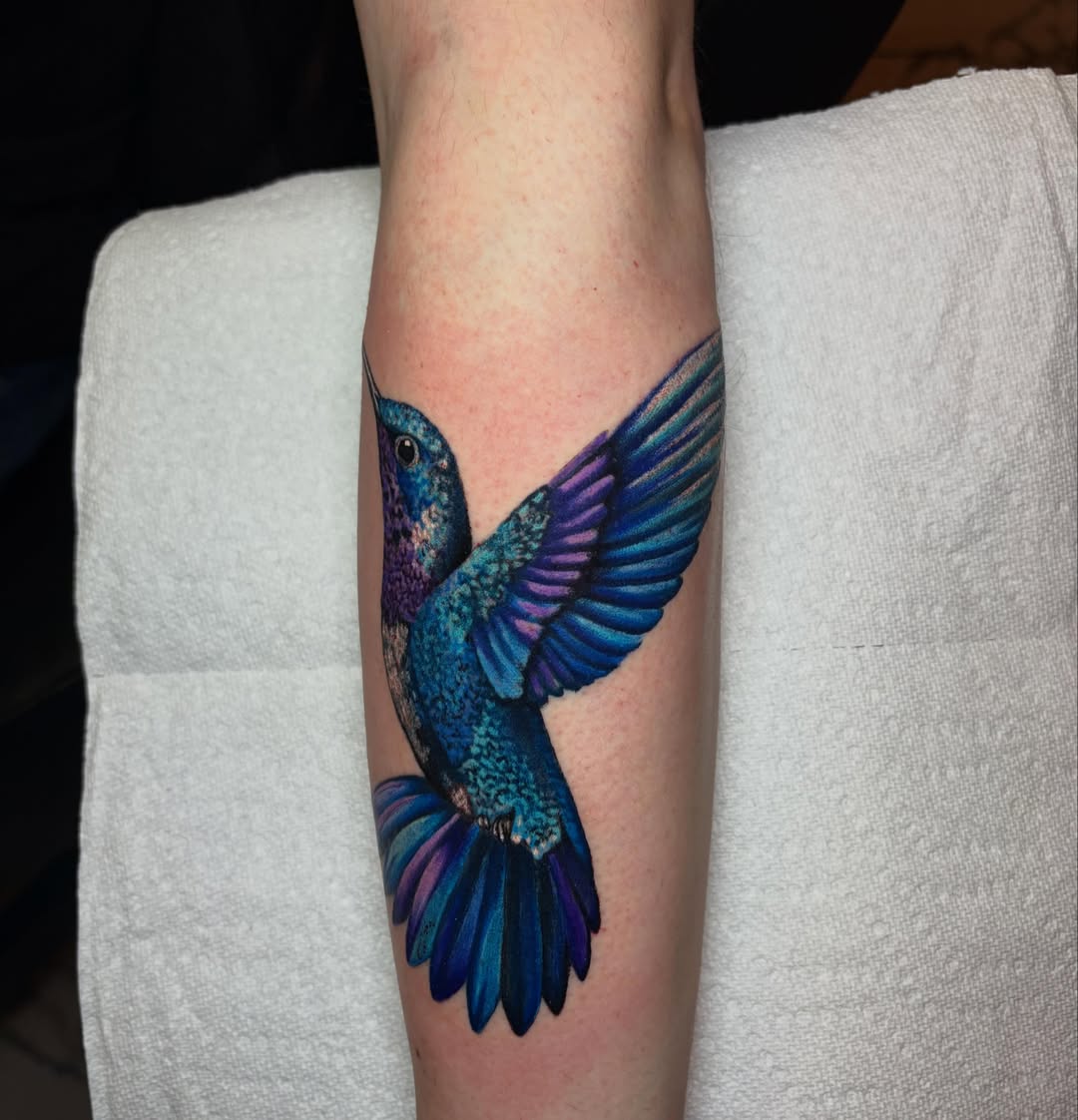 Hummingbird realism tattoo on the forearm by Rachel Sellers