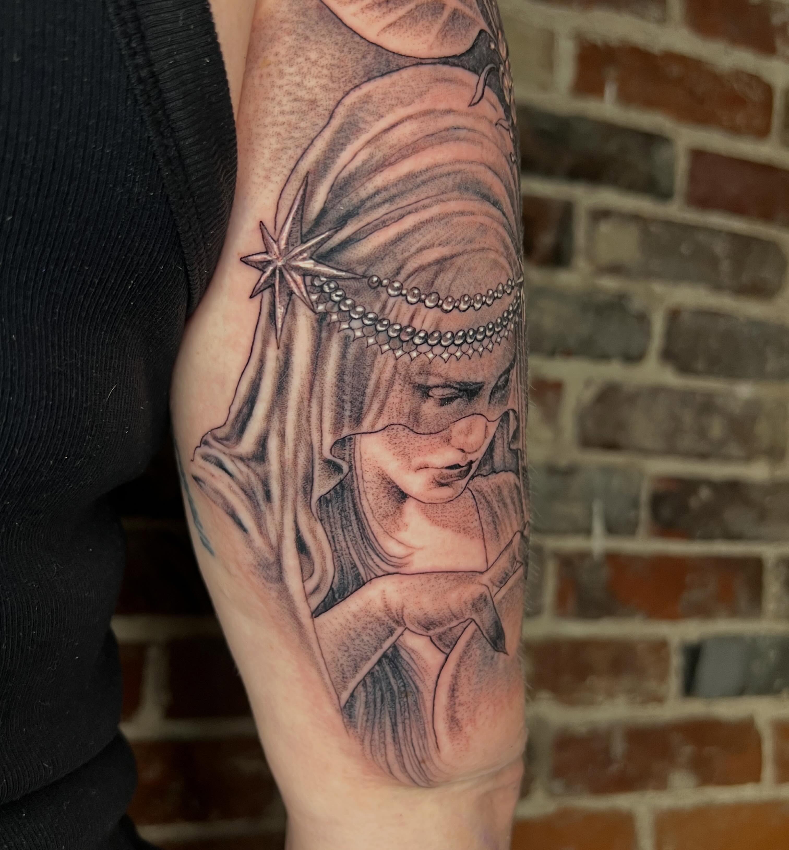 Tattoo by @tallartist — realism, black_and_grey