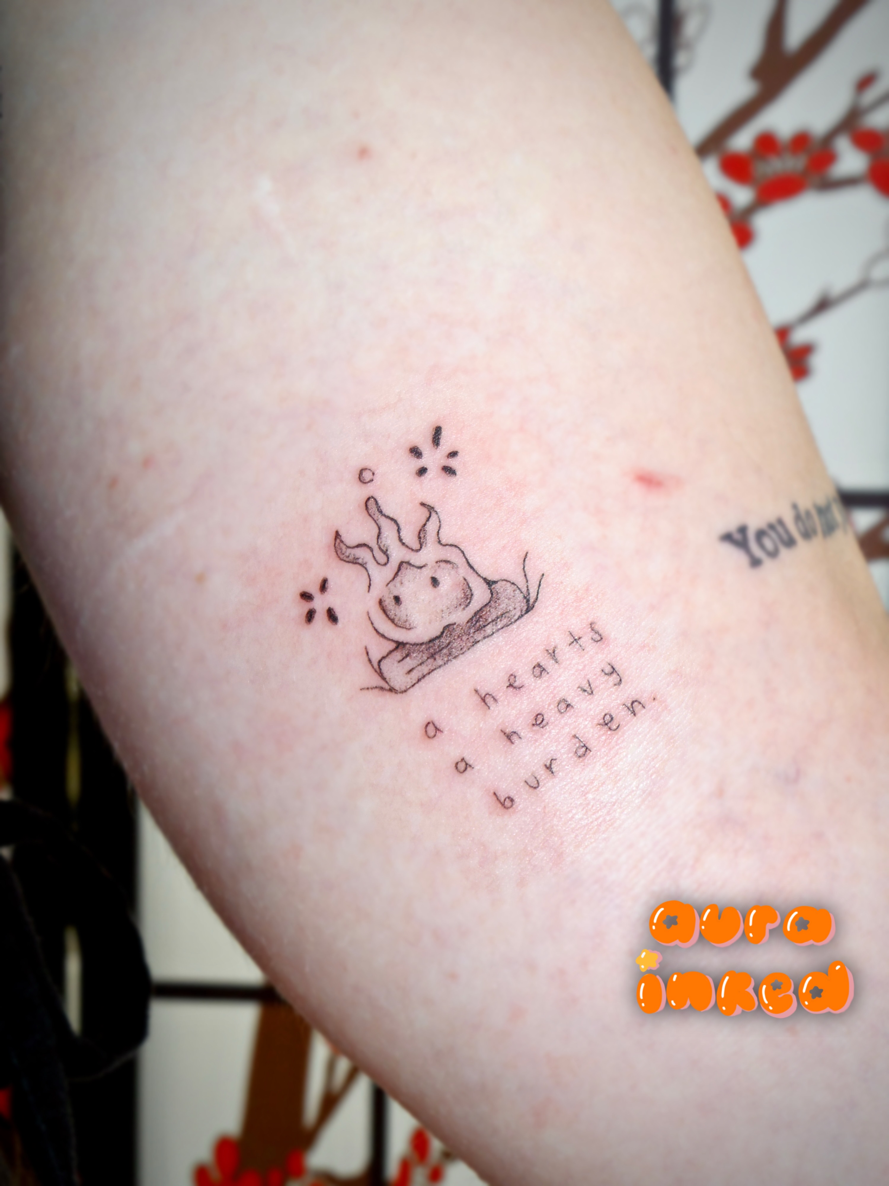 Heart with dog dotwork tattoo on the forearm by Delly ⌯