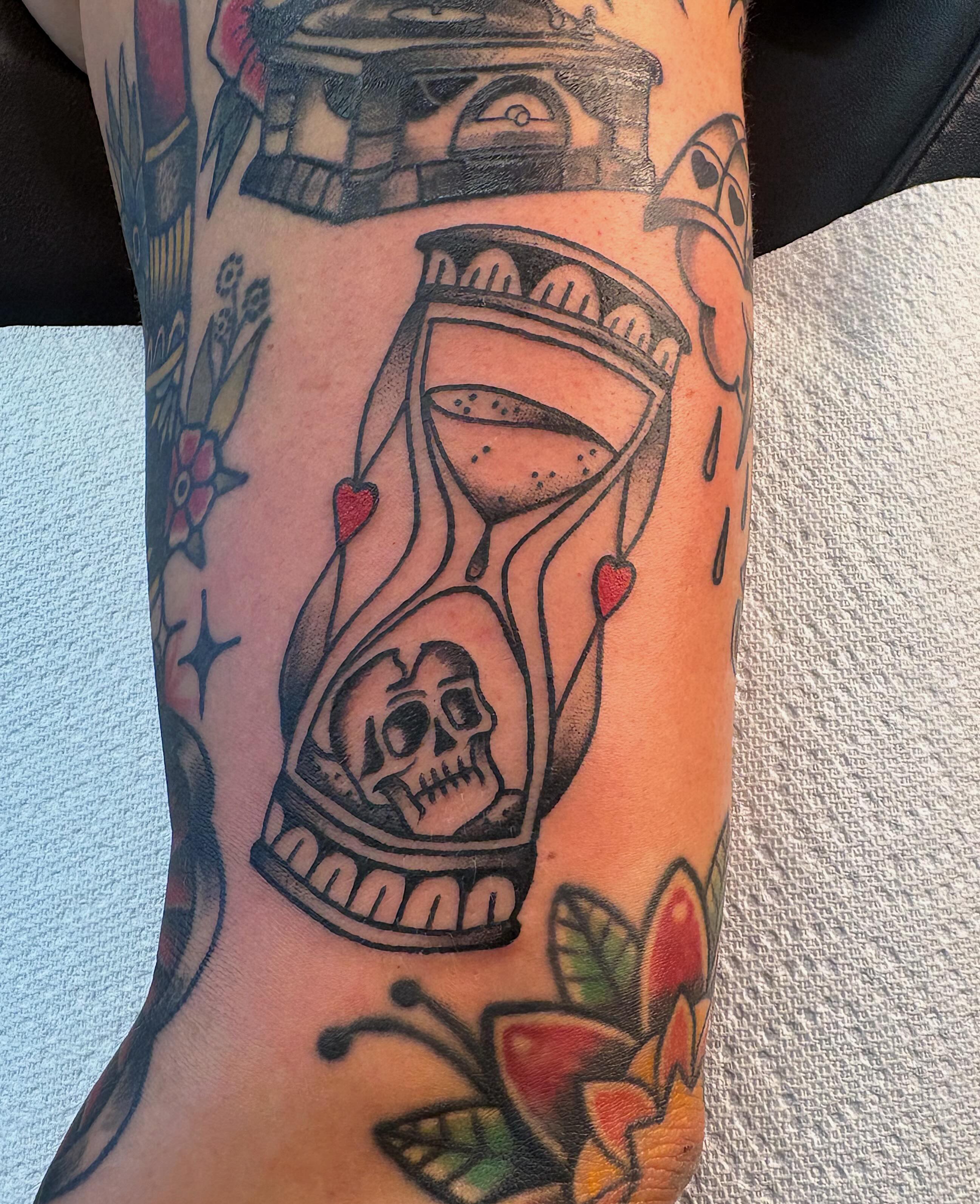Hourglass with skull American traditional tattoo on the forearm by Demi Flores 🖤