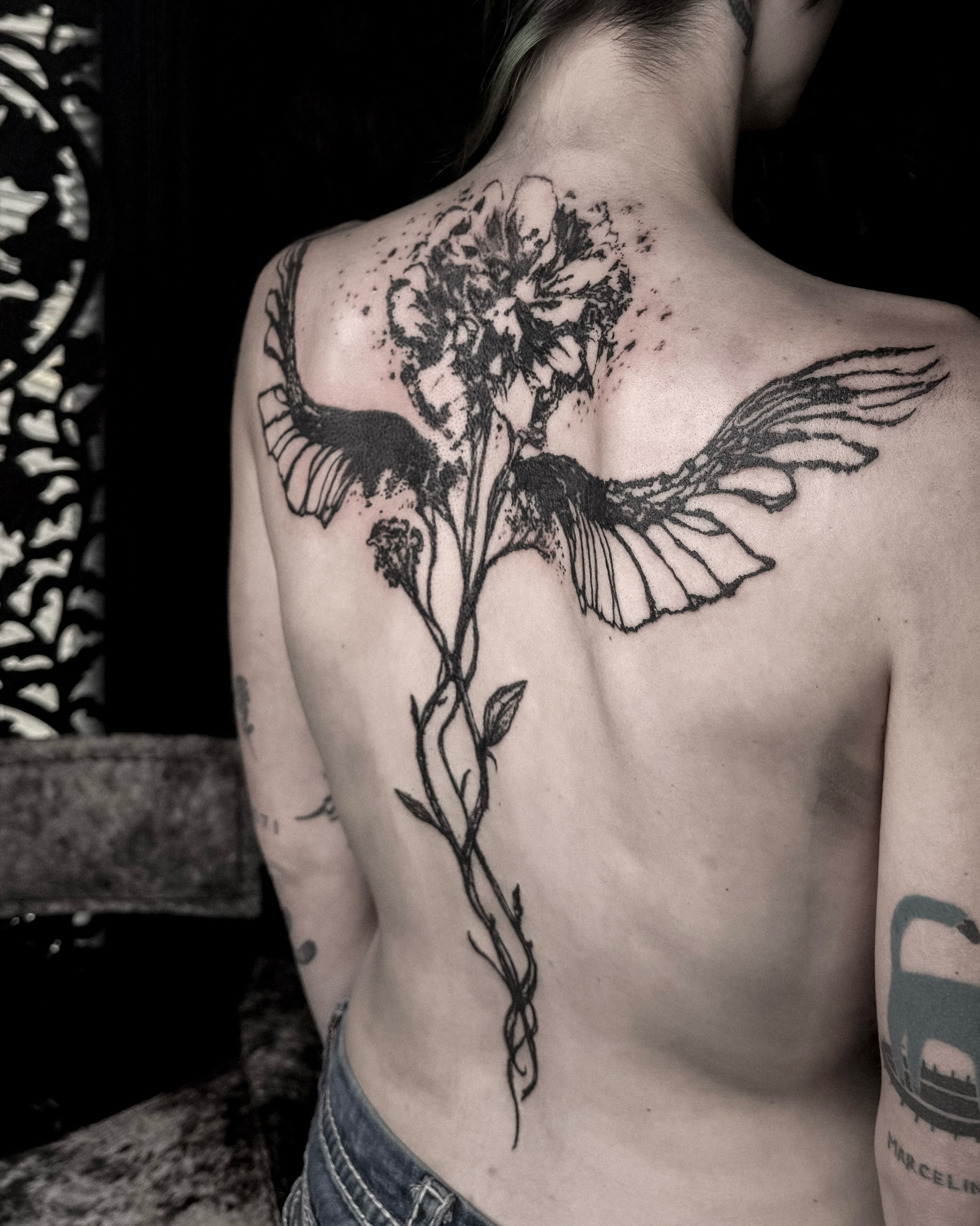 Flower with wings realism tattoo on the back by ąʑཞąıą ཞąıŋ