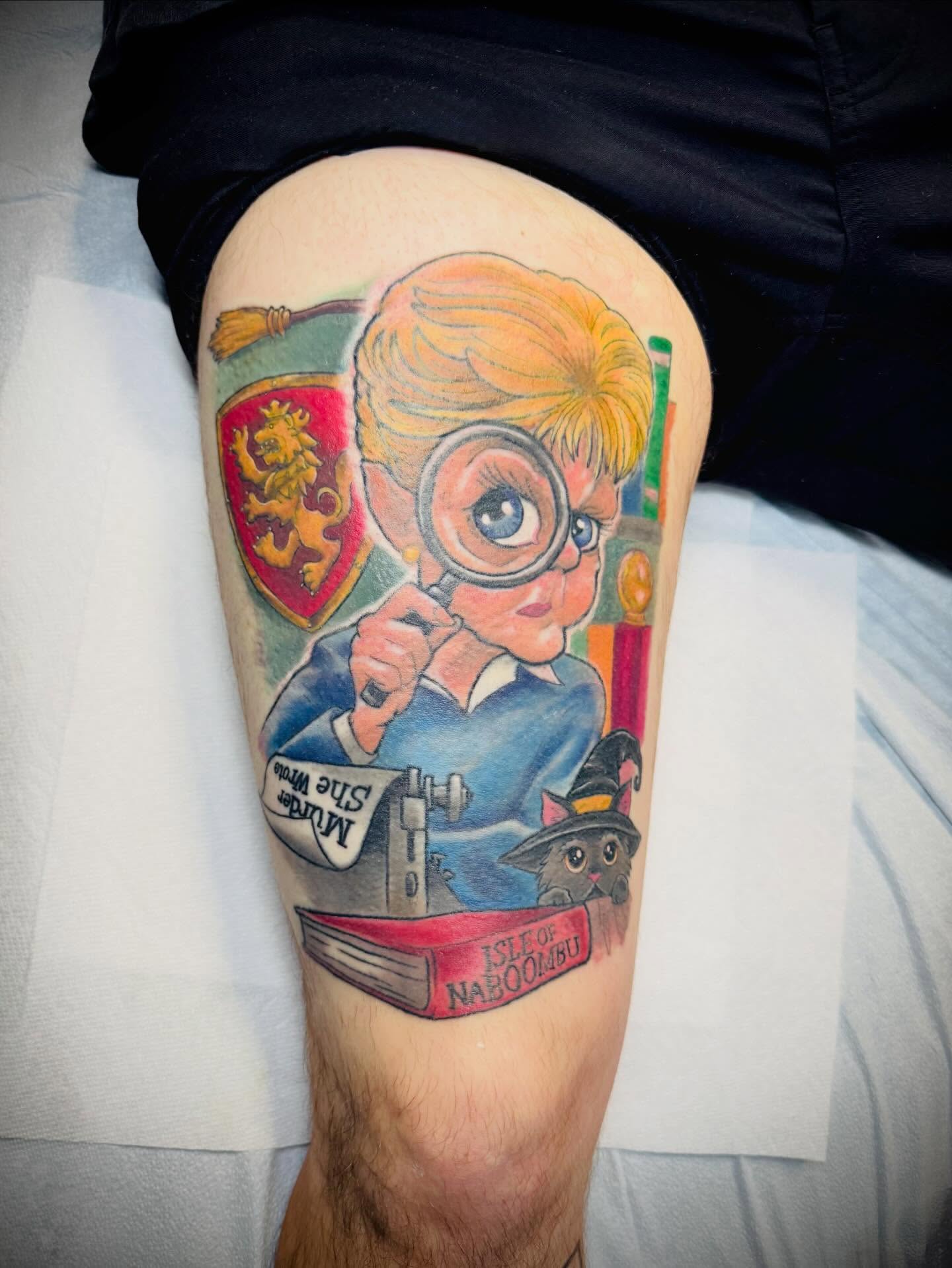 Detective illustrative tattoo on the thigh by San Diego Tattoo Artist