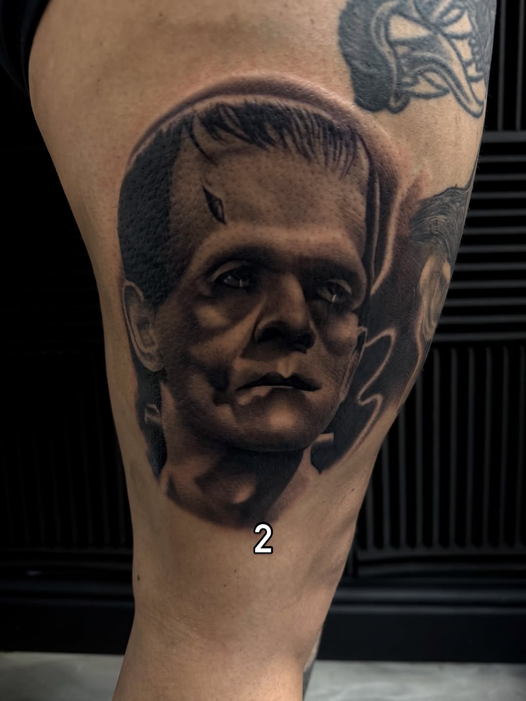 Frankenstein's monster portrait realism tattoo on the forearm by Nick Campbell