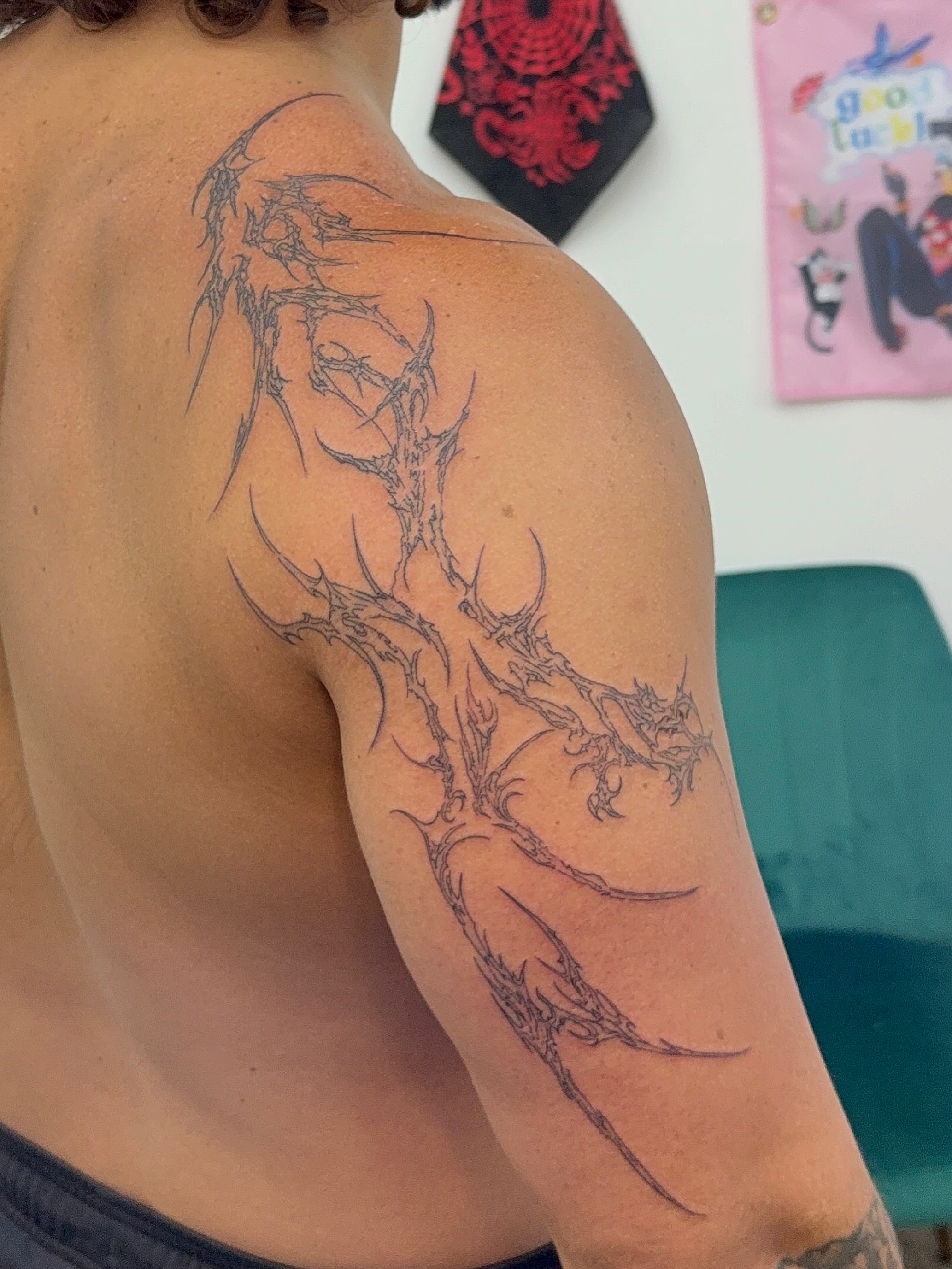 Dragon black and grey tattoo on the shoulder by ꧁༒