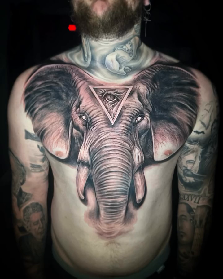 Elephant head with eye of providence realism tattoo by Daniel Fisher, Berlin, New Jersey