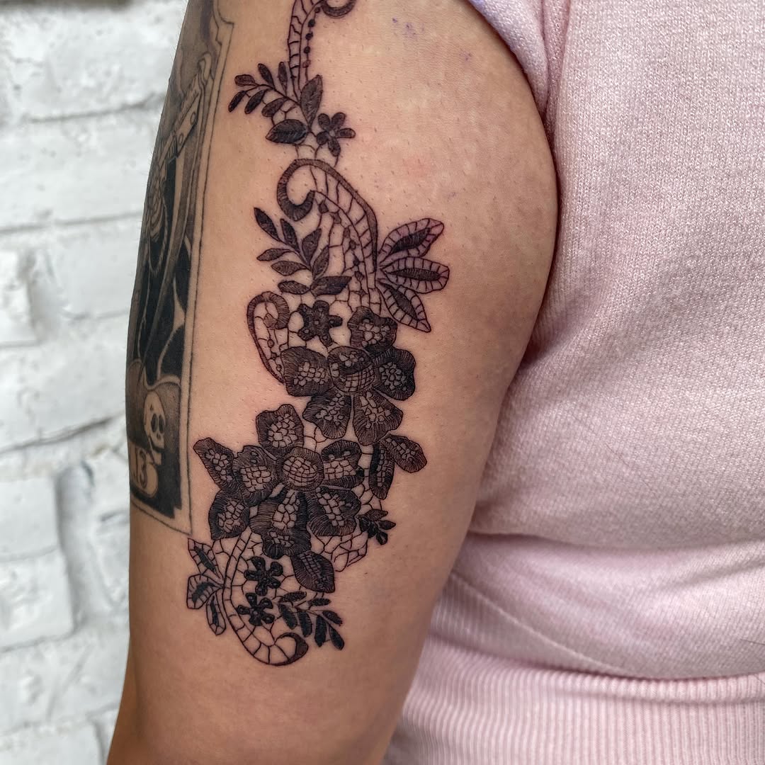 Lace and flowers dotwork tattoo on the forearm by °₊⊹ delia ✩ jane ೃ࿔*