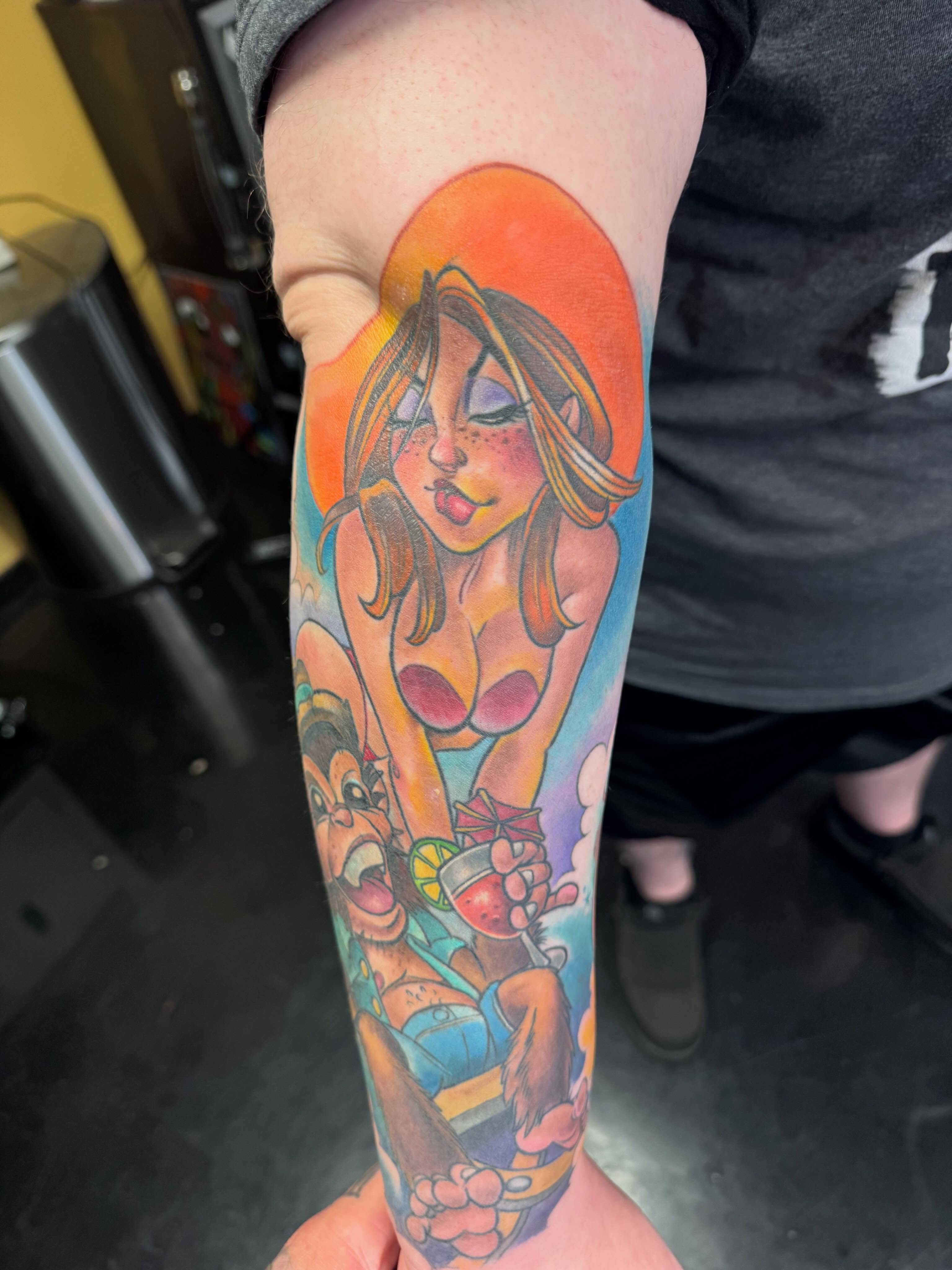 Beach scene new school tattoo on the forearm by Joe Capobianco, New Haven, Connecticut