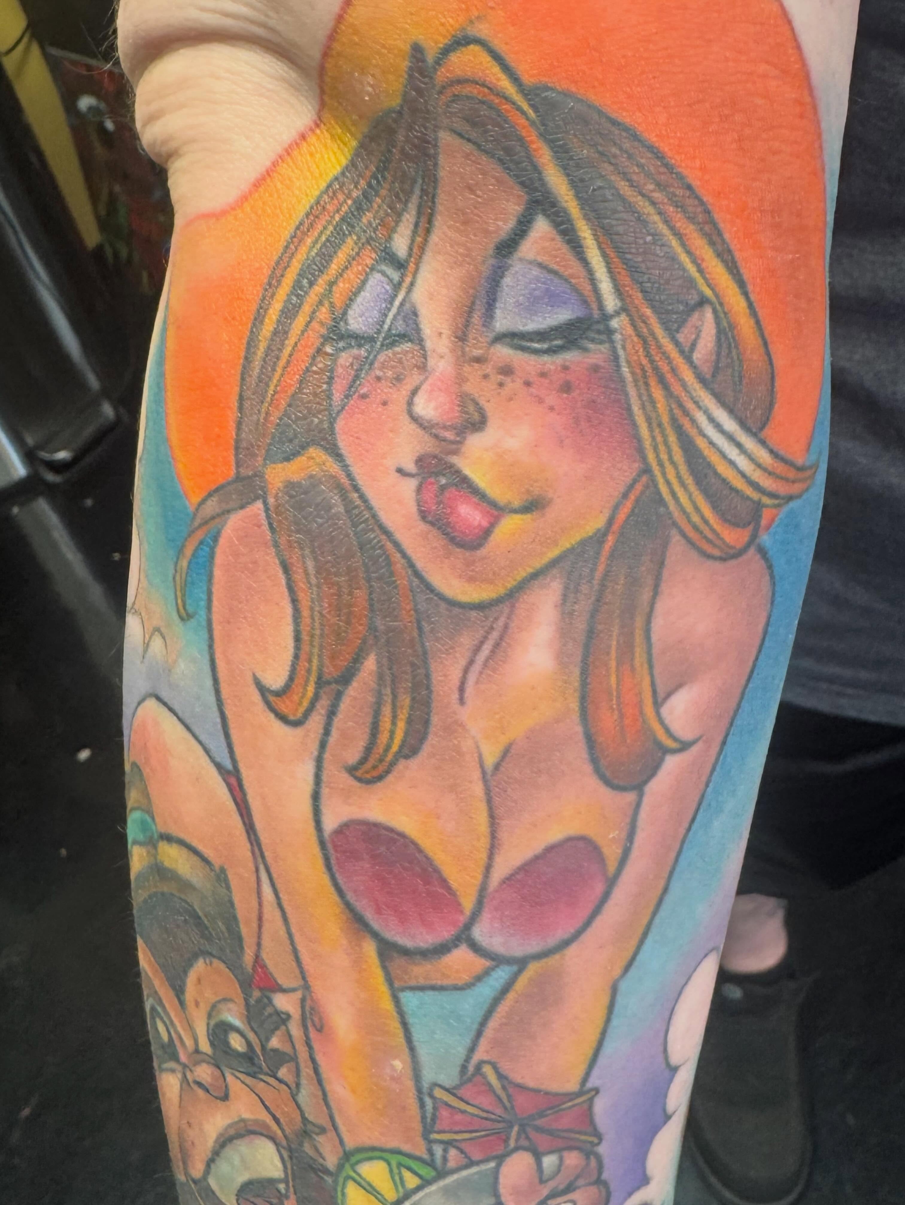 Woman in bikini illustrative tattoo on the forearm by Joe Capobianco, New Haven, Connecticut