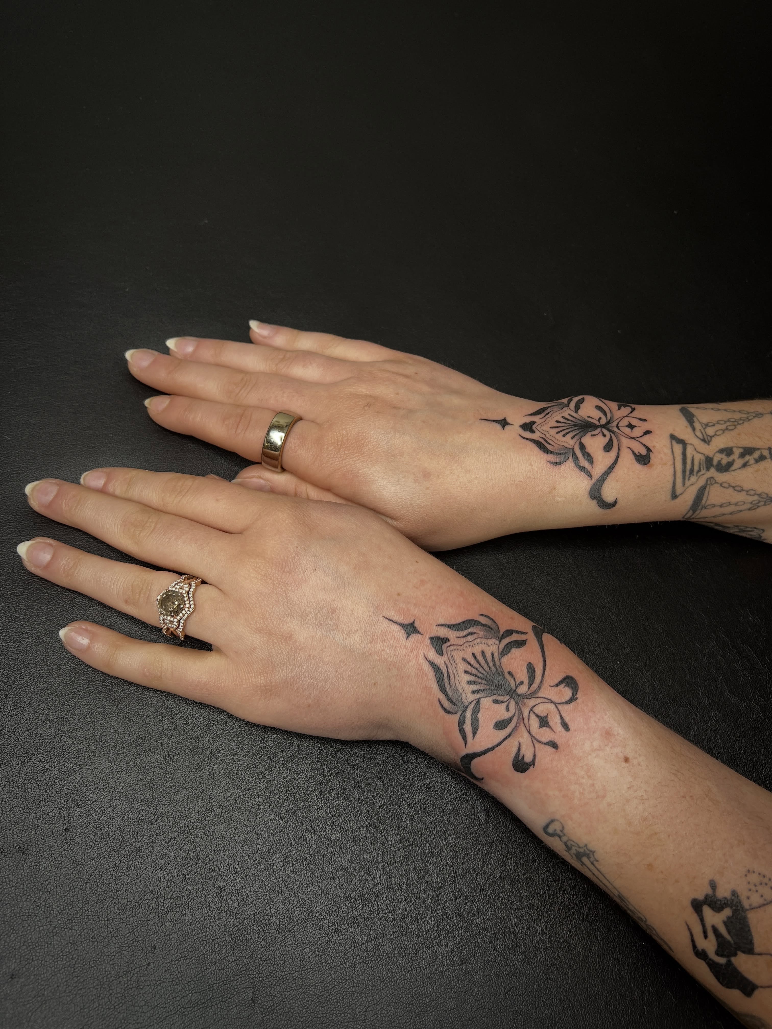 Floral design black and grey tattoo on the forearm by Elleree (LRE)