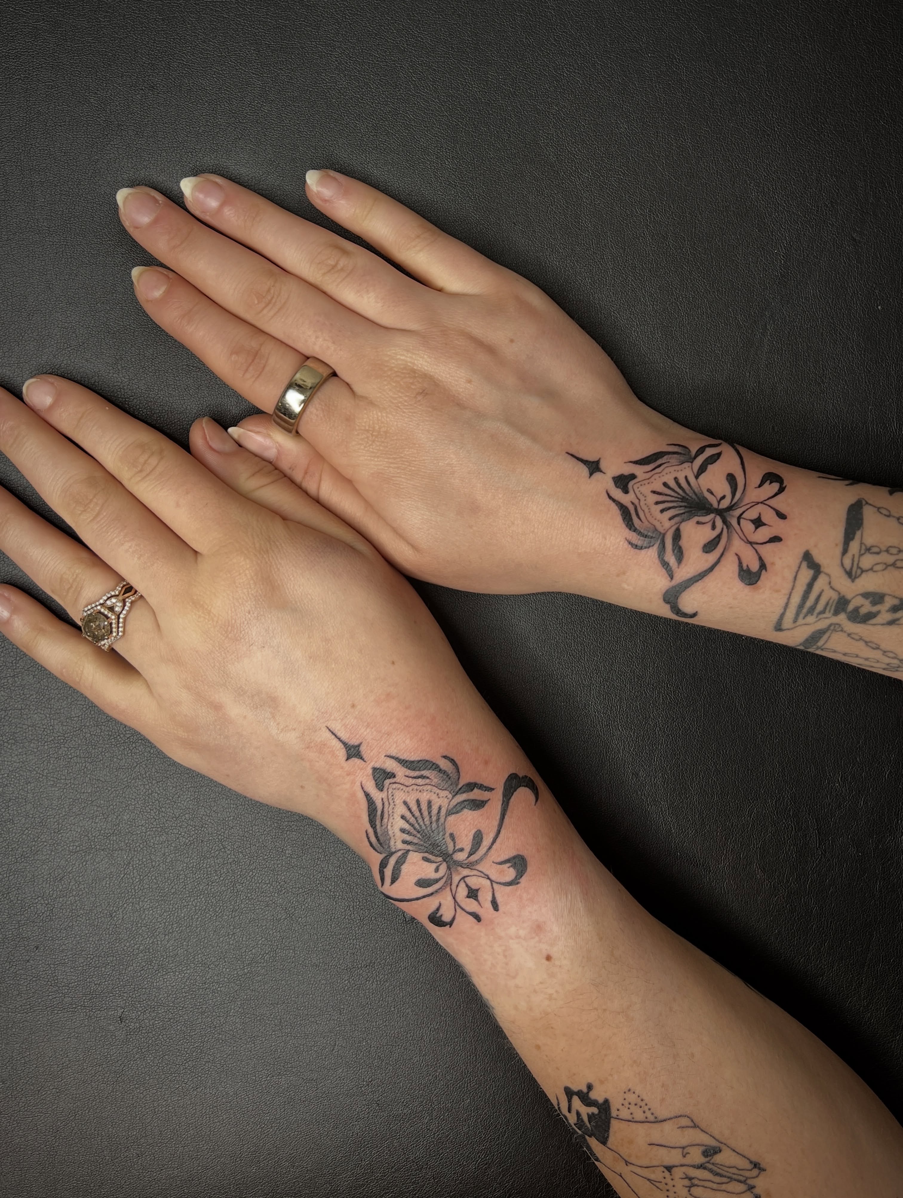 Floral black and grey tattoo on the forearm by Elleree (LRE)