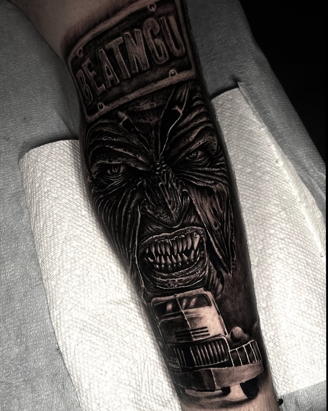 Horror monster realism tattoo on the forearm by Trev