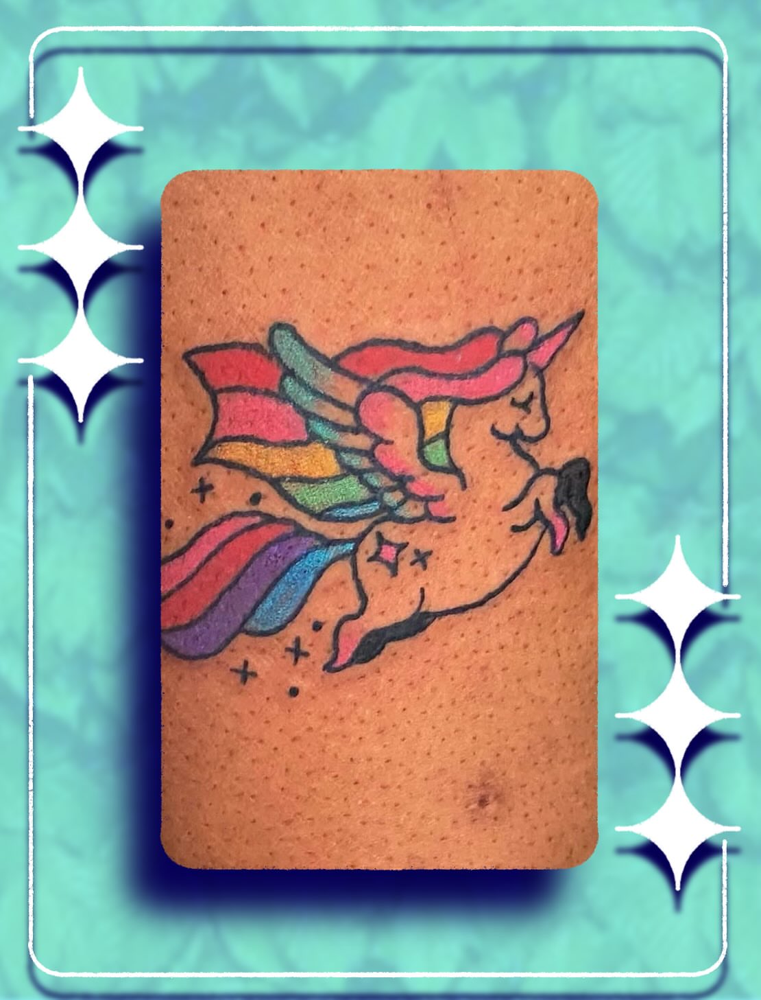 Rainbow unicorn new school tattoo on the forearm by Gus Roach Graves
